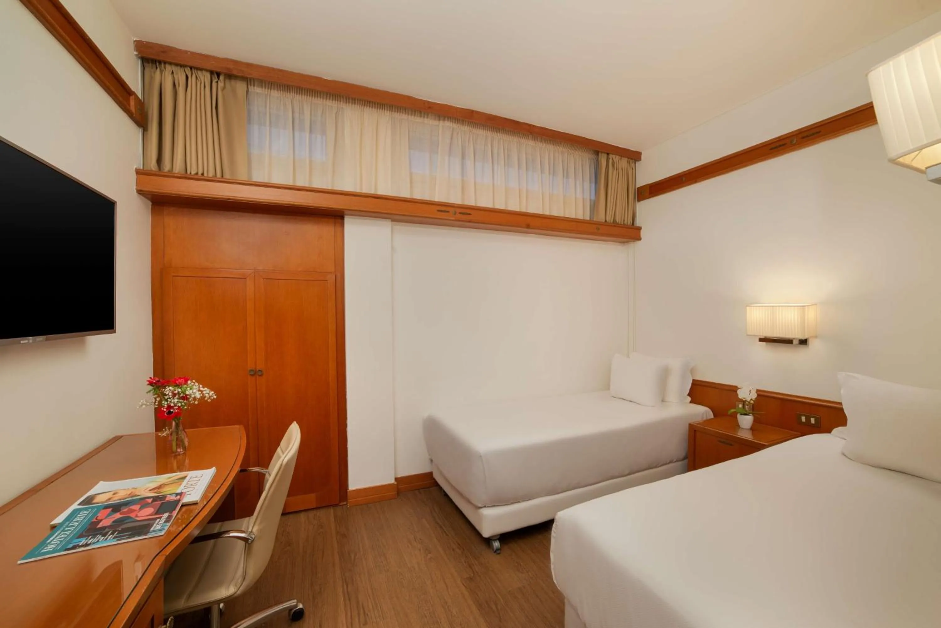 Photo of the whole room, Bed in NH Pisa