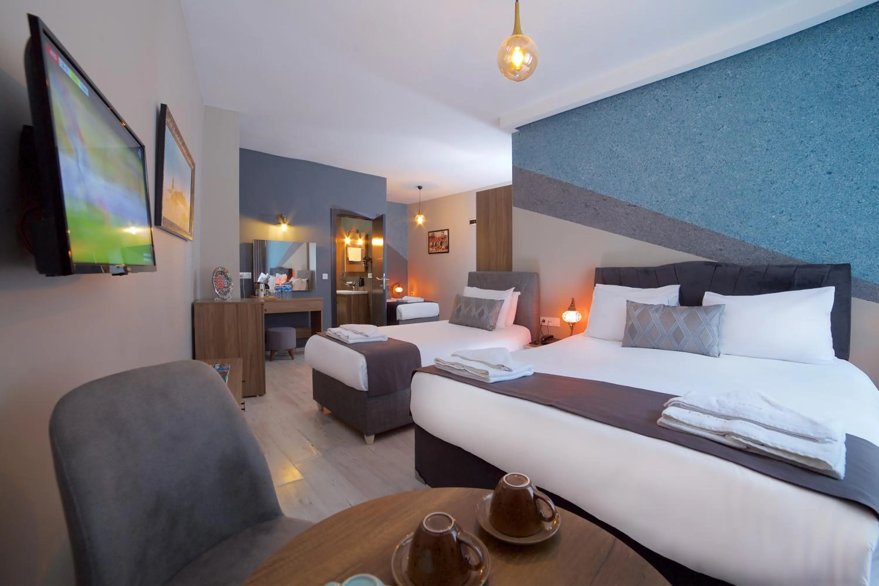 Bed in La Vida Old City Hotel