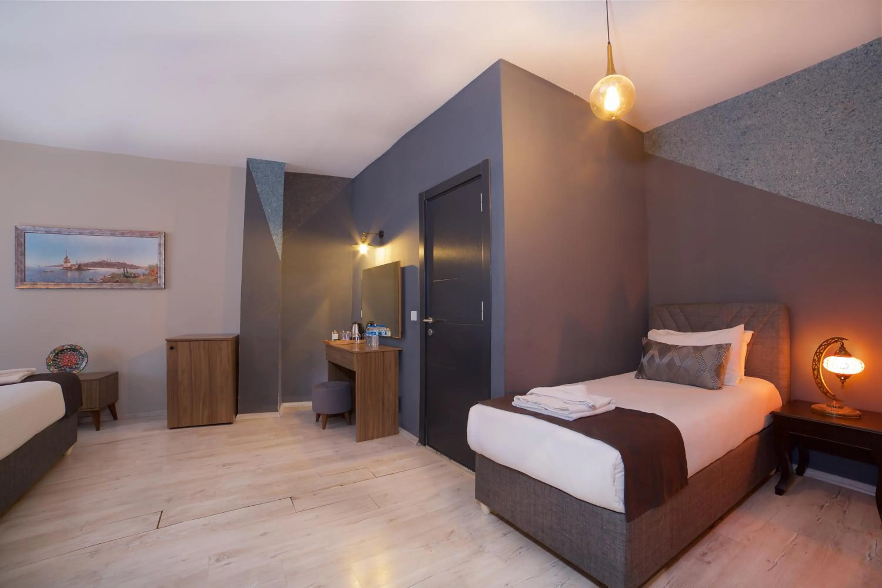 Bed in La Vida Old City Hotel