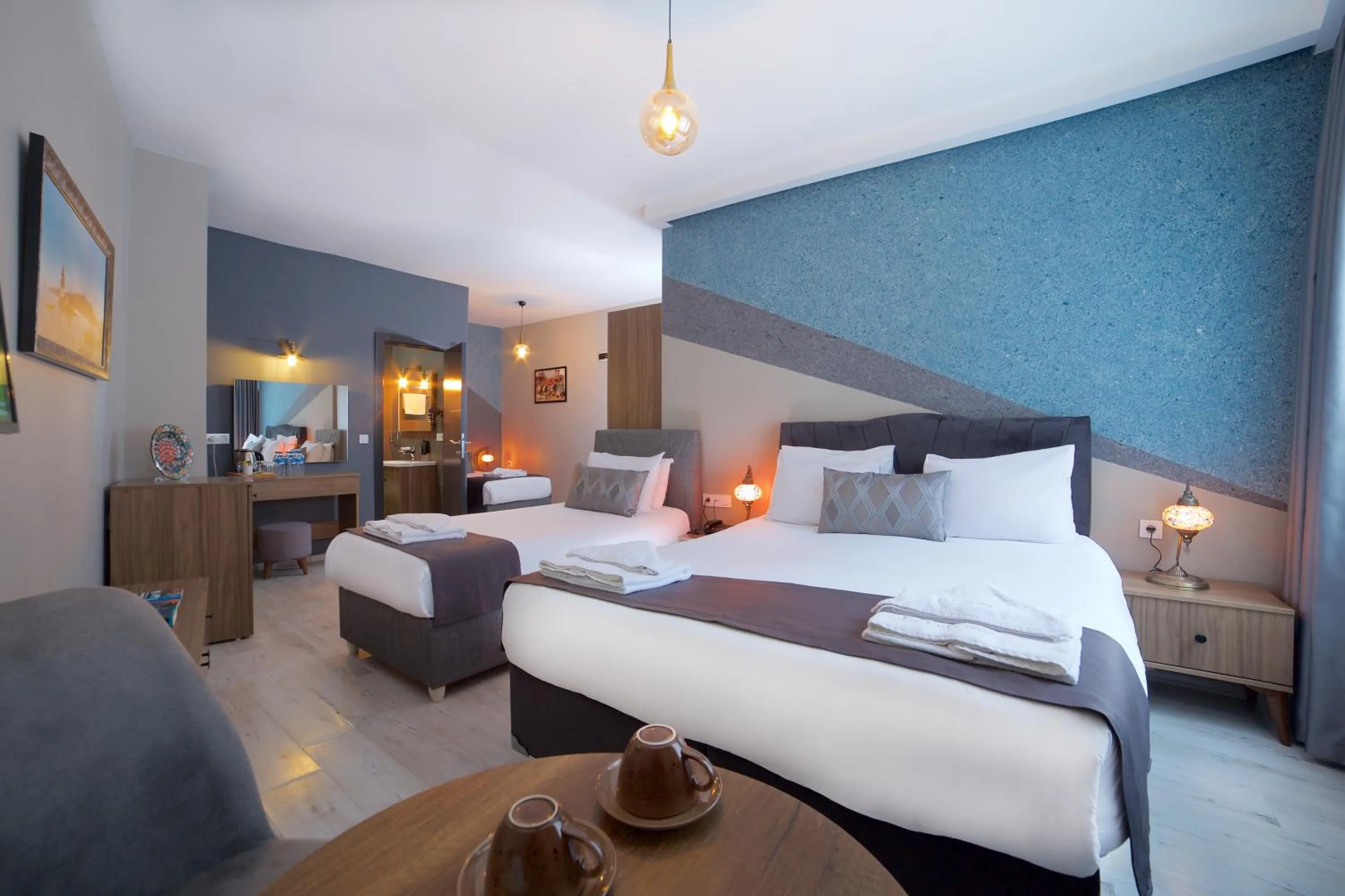 Bed in La Vida Old City Hotel