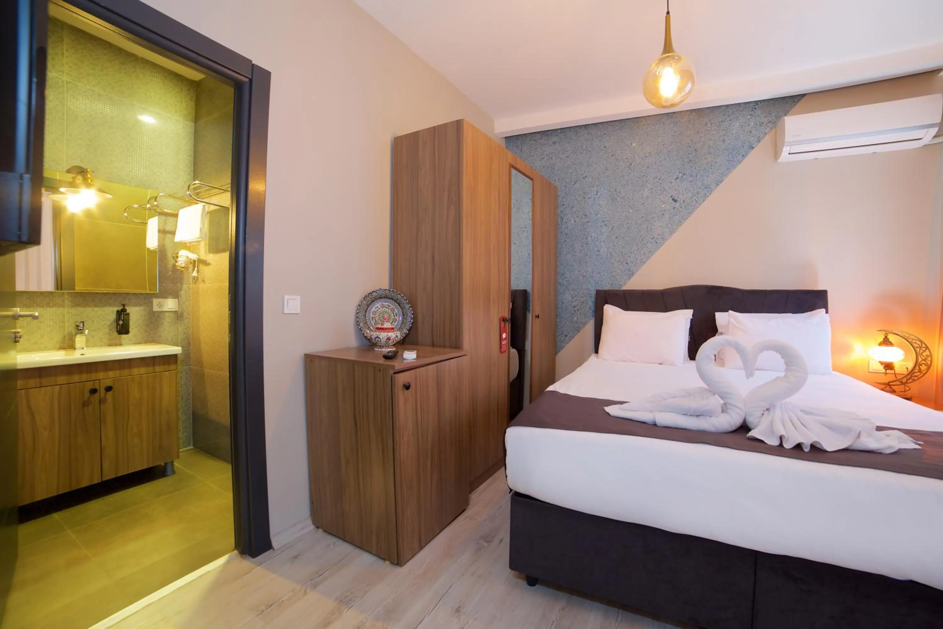 Bed in La Vida Old City Hotel