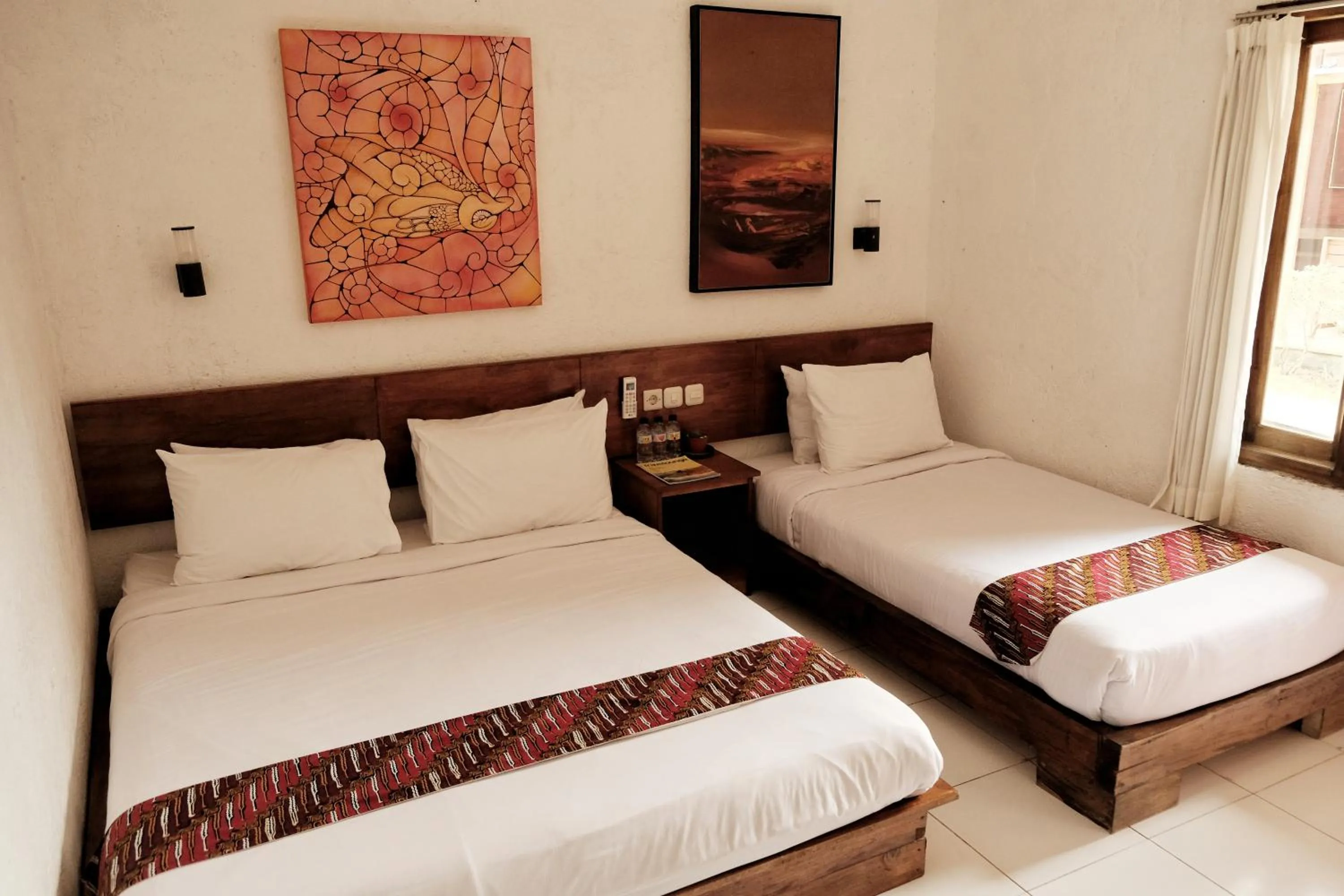Bed in Cempaka Borobudur Guest House