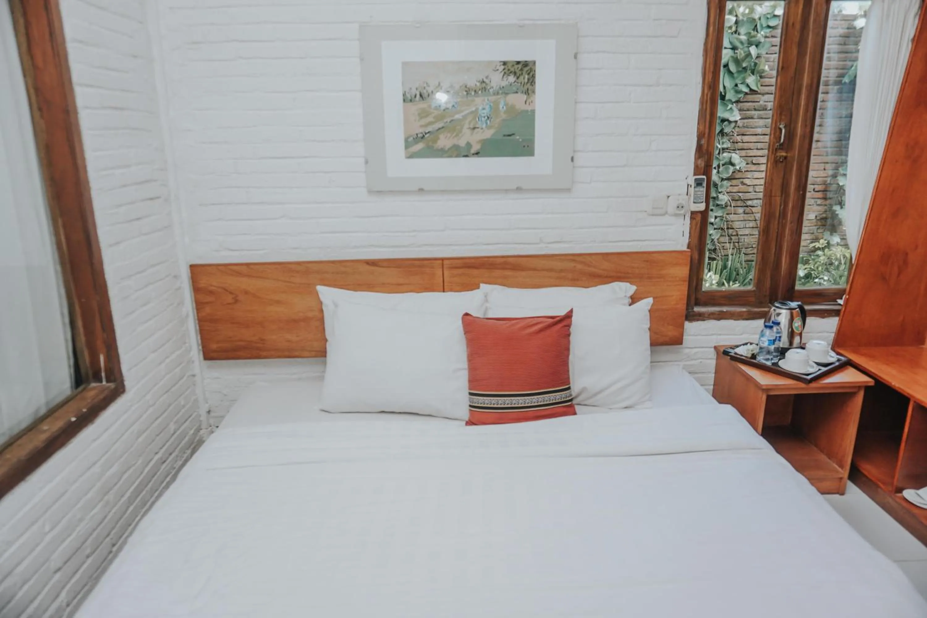 Bed in Cempaka Borobudur Guest House