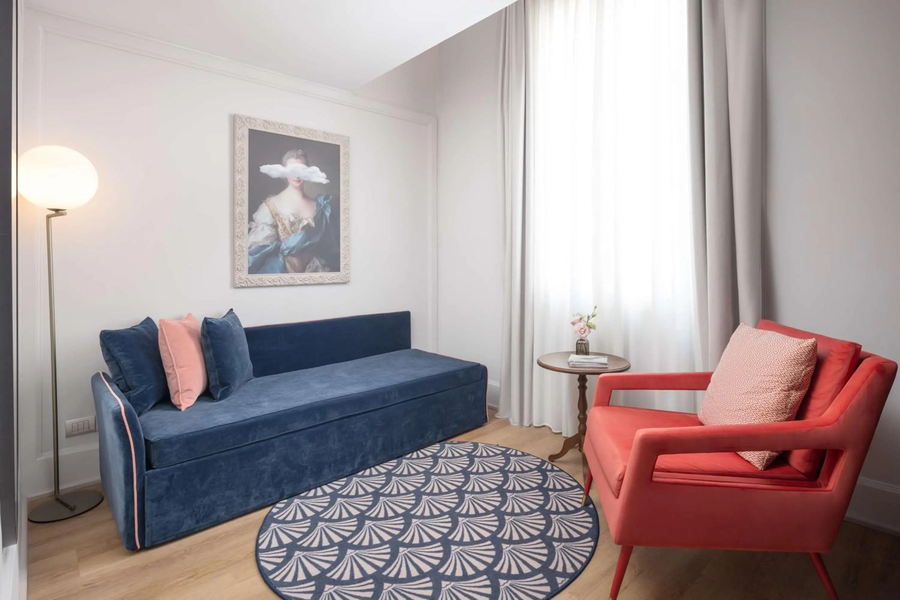 Living room in Anglo American Hotel Florence, Curio Collection By Hilton