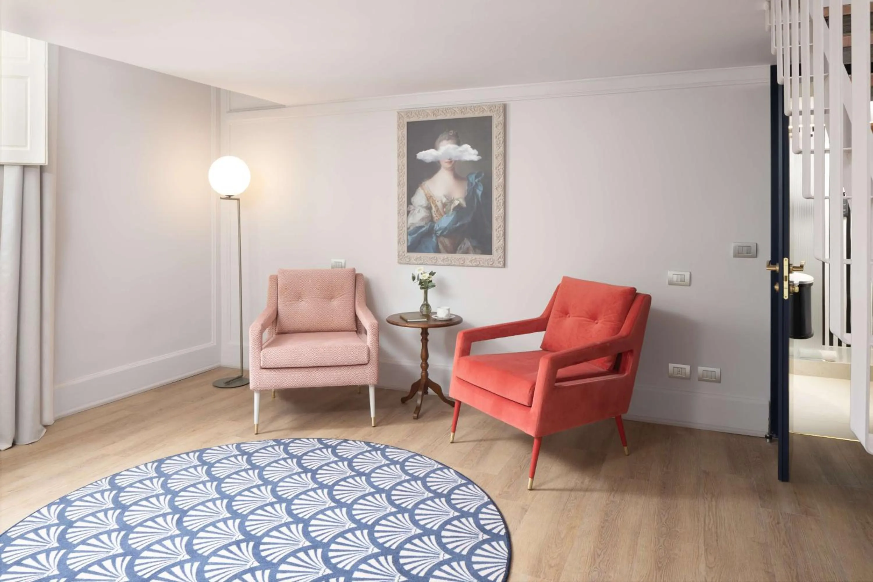 Living room in Anglo American Hotel Florence, Curio Collection By Hilton