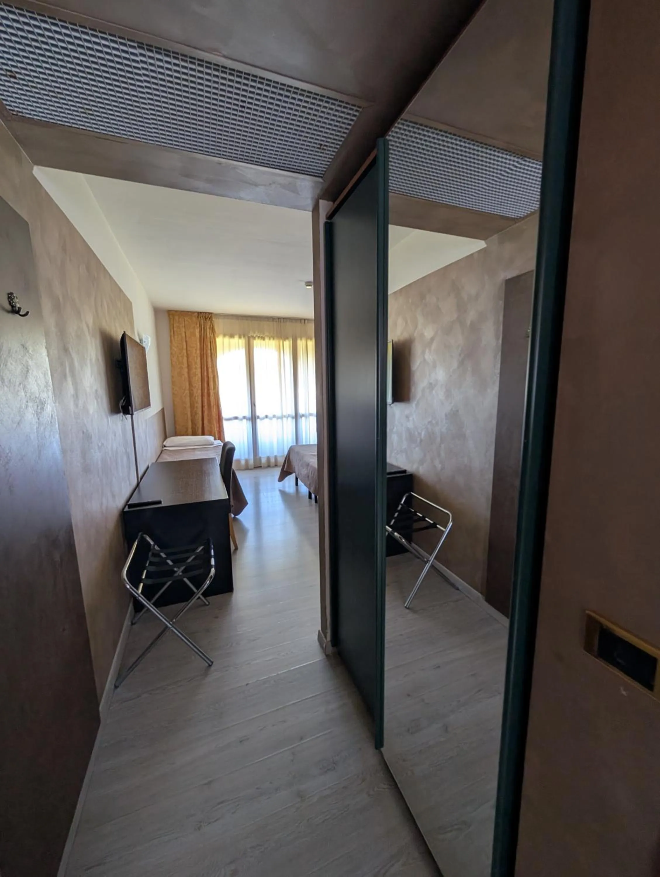 Bedroom in Hotel Carignano