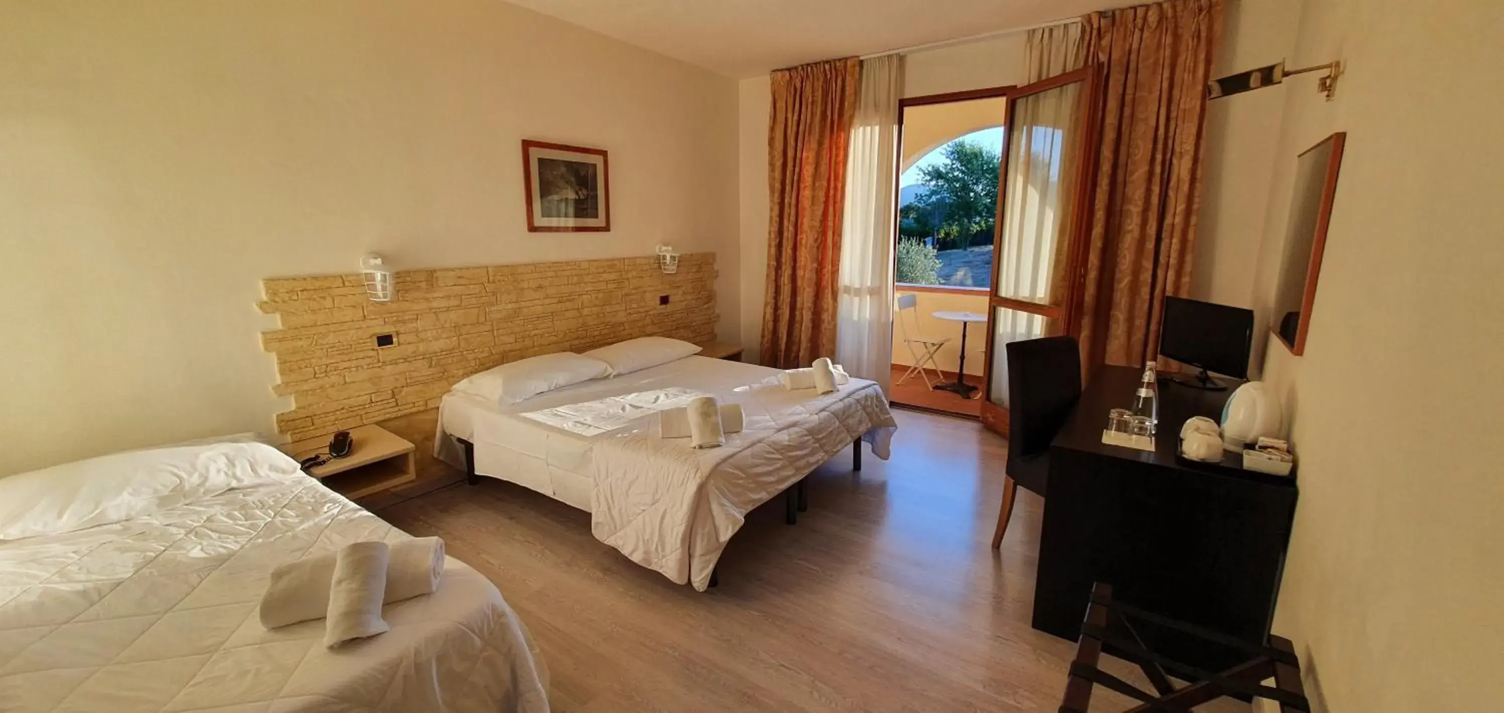 Quadruple Room in Hotel Carignano Quadruple Room in Hotel Carignano