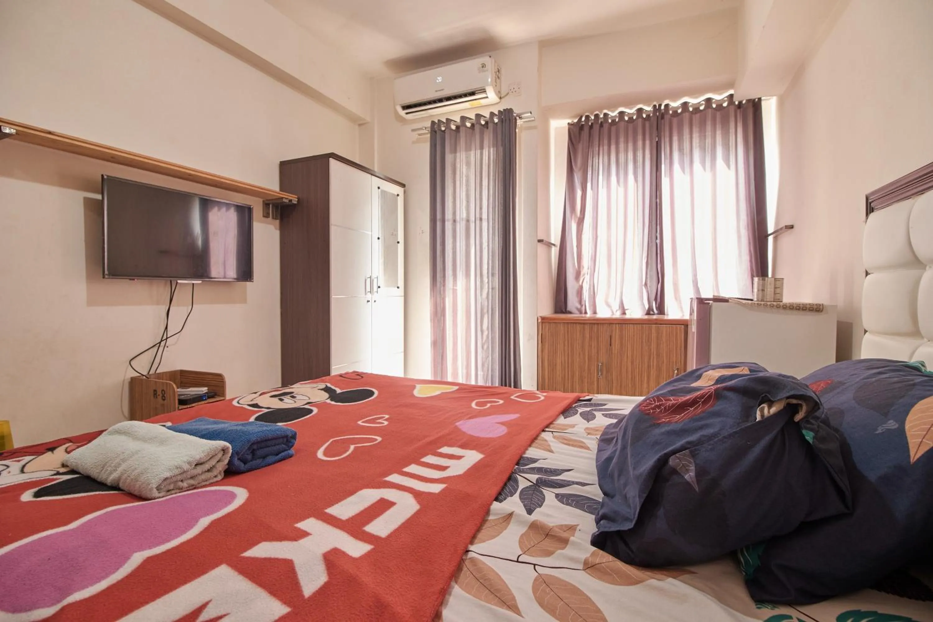 Bed in Room Rendi Podomoro Golf View