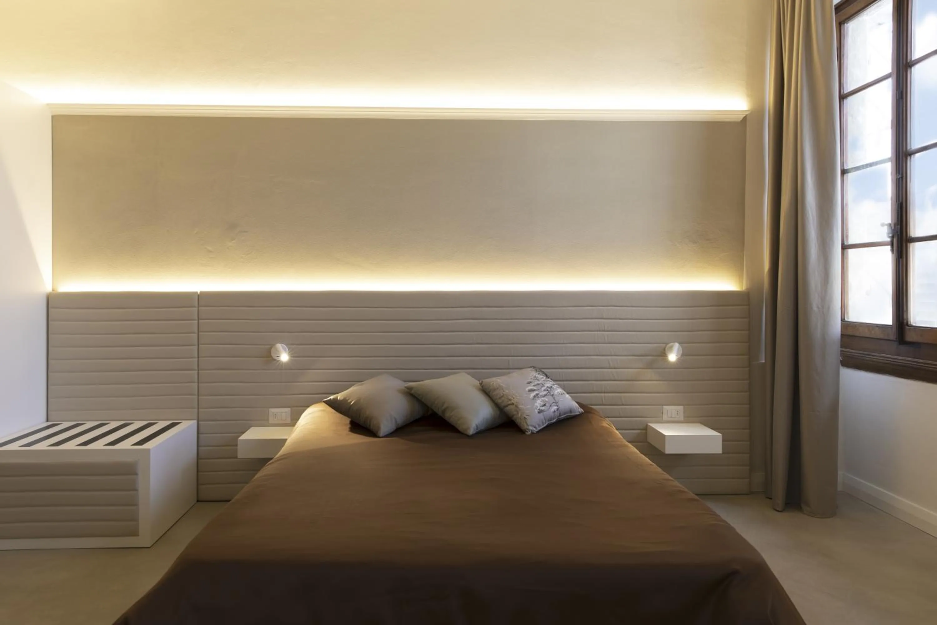 Bed in Palazzo dei Ciompi Suites