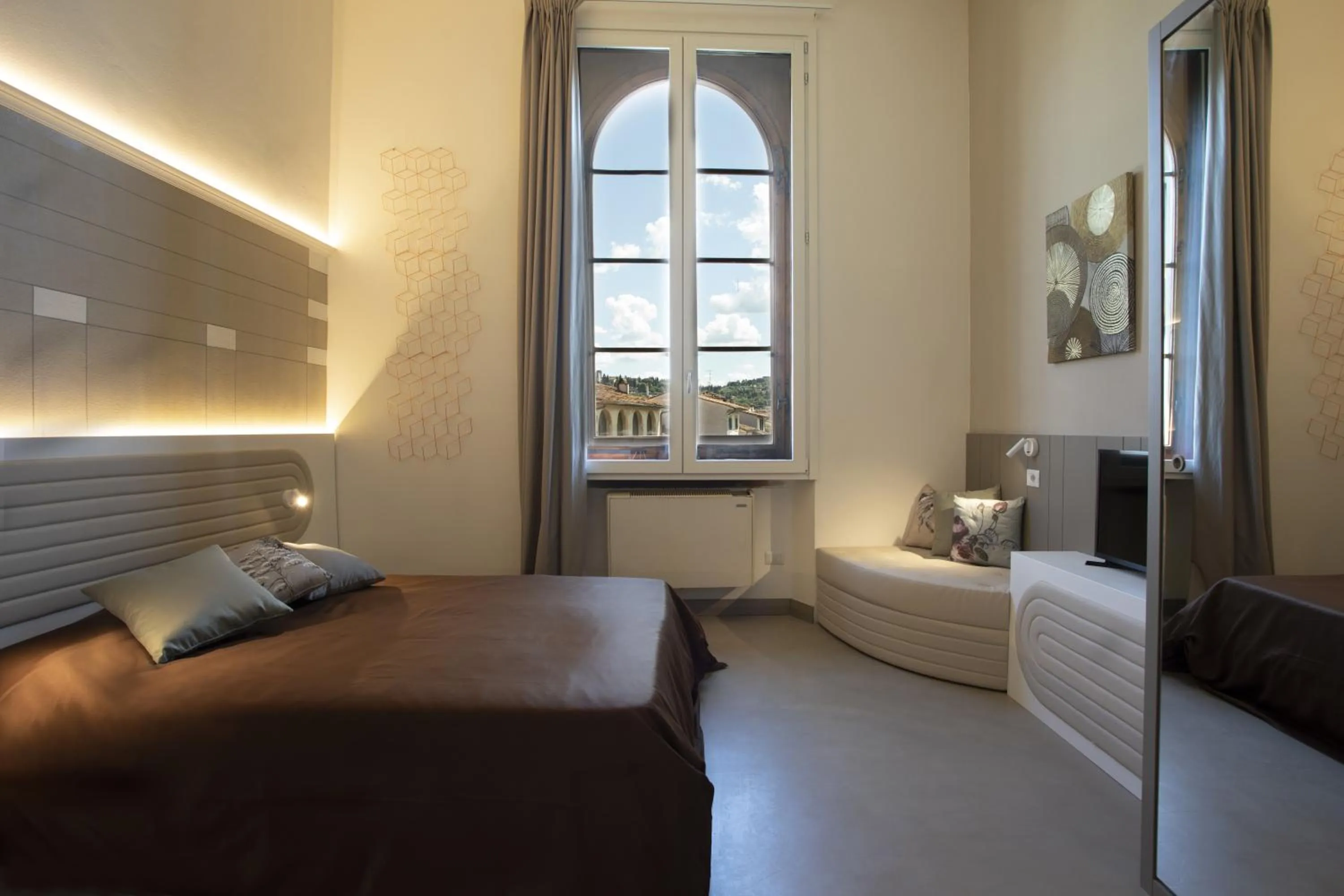 Bed in Palazzo dei Ciompi Suites