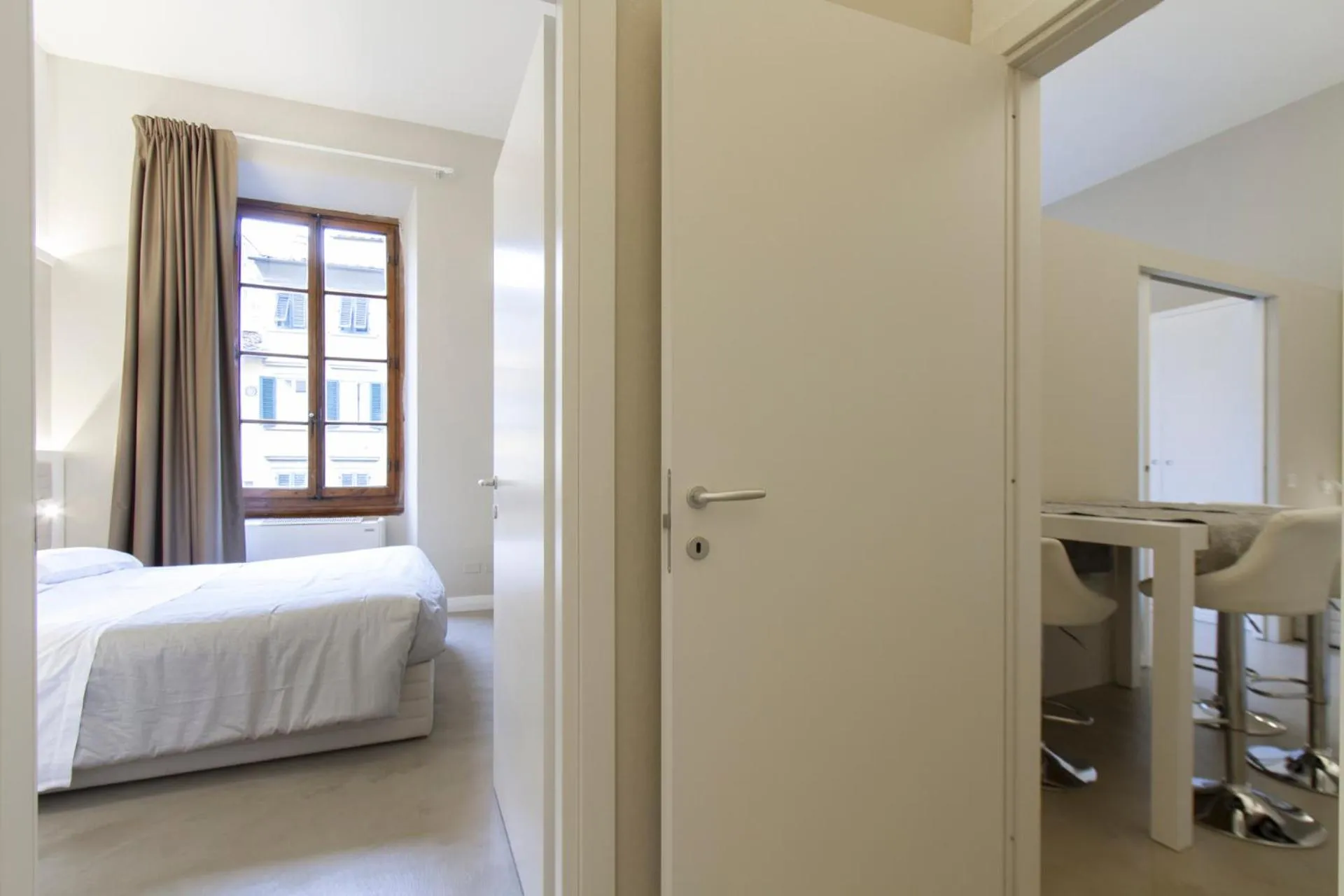Dining area, Bed in Palazzo dei Ciompi Suites