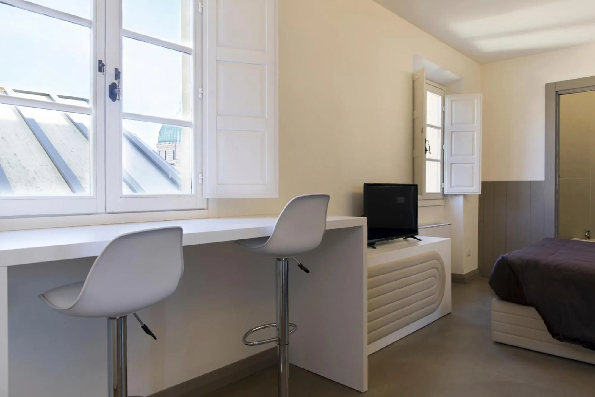 Bed in Palazzo dei Ciompi Suites