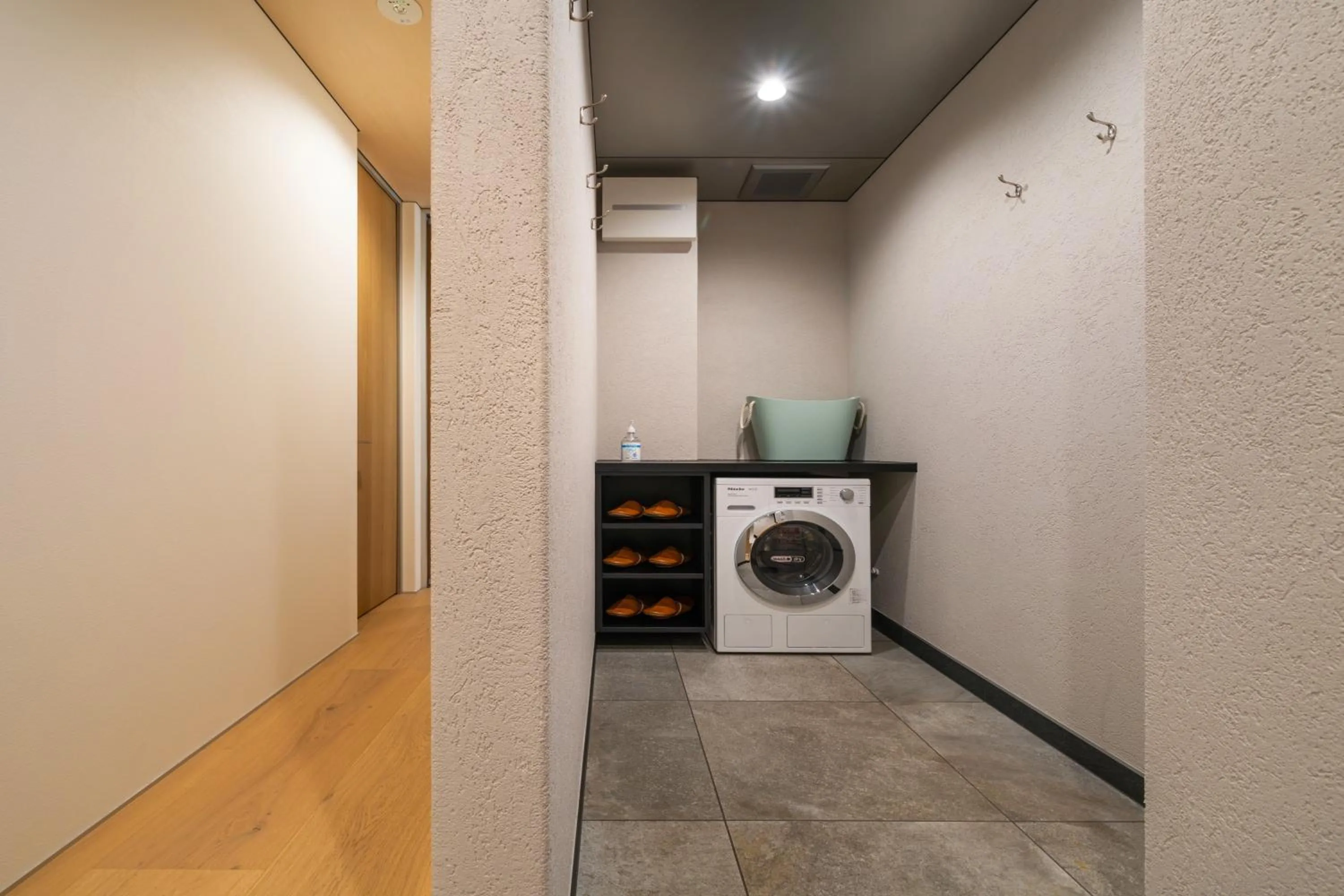 washing machine in Blue River Chalets by The Hakuba Collection