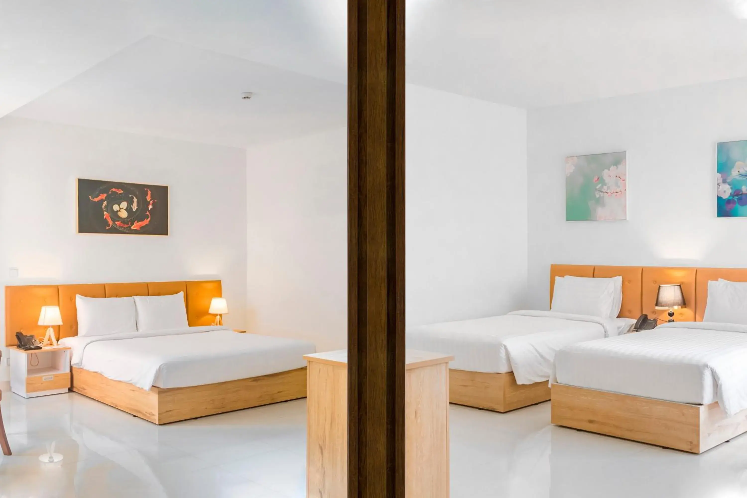 Villa Family Connecting Room - 1 Double and 2 Single Beds Garden View in Sea Breeze Hotel & Villa Villa Family Connecting Room - 1 Double and 2 Single Beds Garden View in Sea Breeze Hotel & Villa