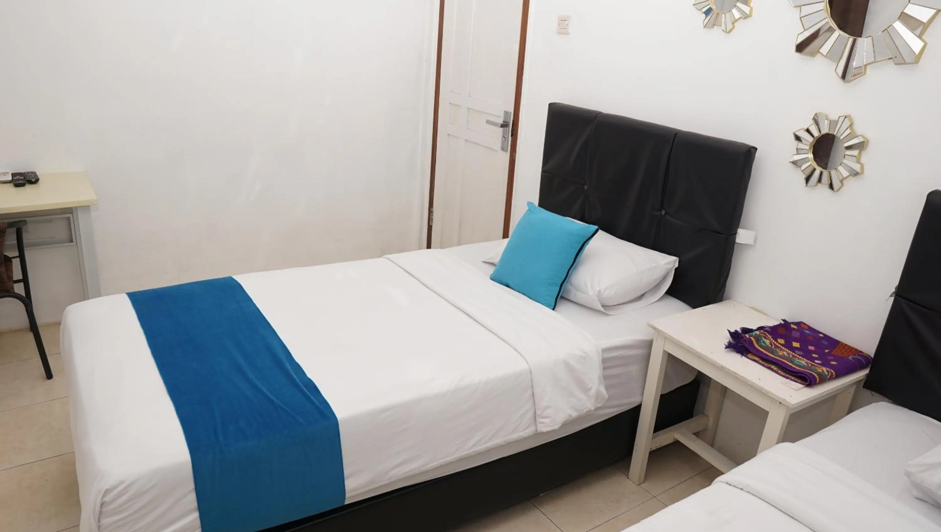 Bed in Jazz Room Kampung Inggris Syariah