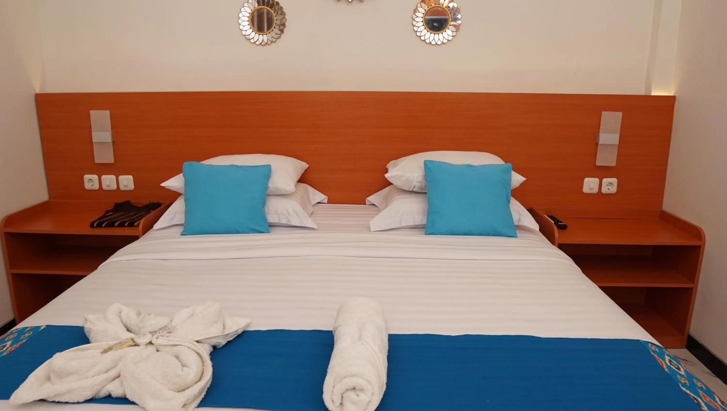 Bed in Jazz Room Kampung Inggris Syariah