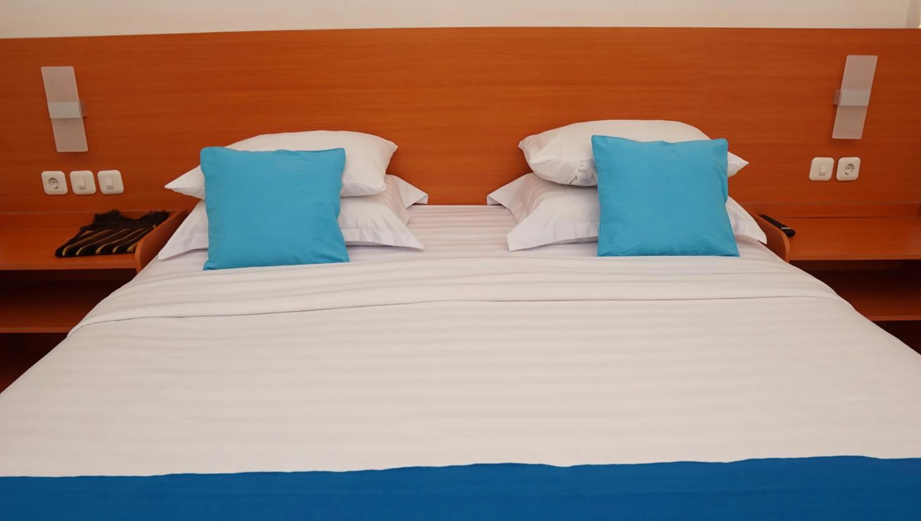 Bed in Jazz Room Kampung Inggris Syariah