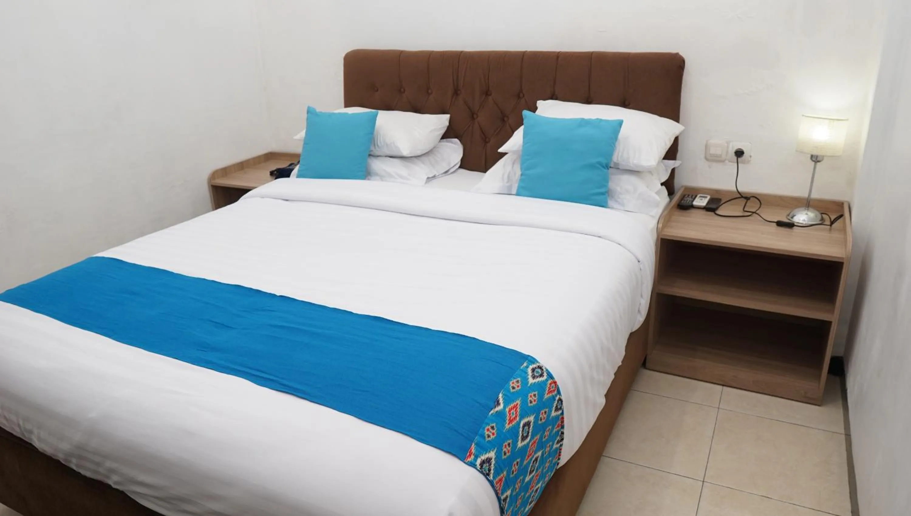 Bed in Jazz Room Kampung Inggris Syariah