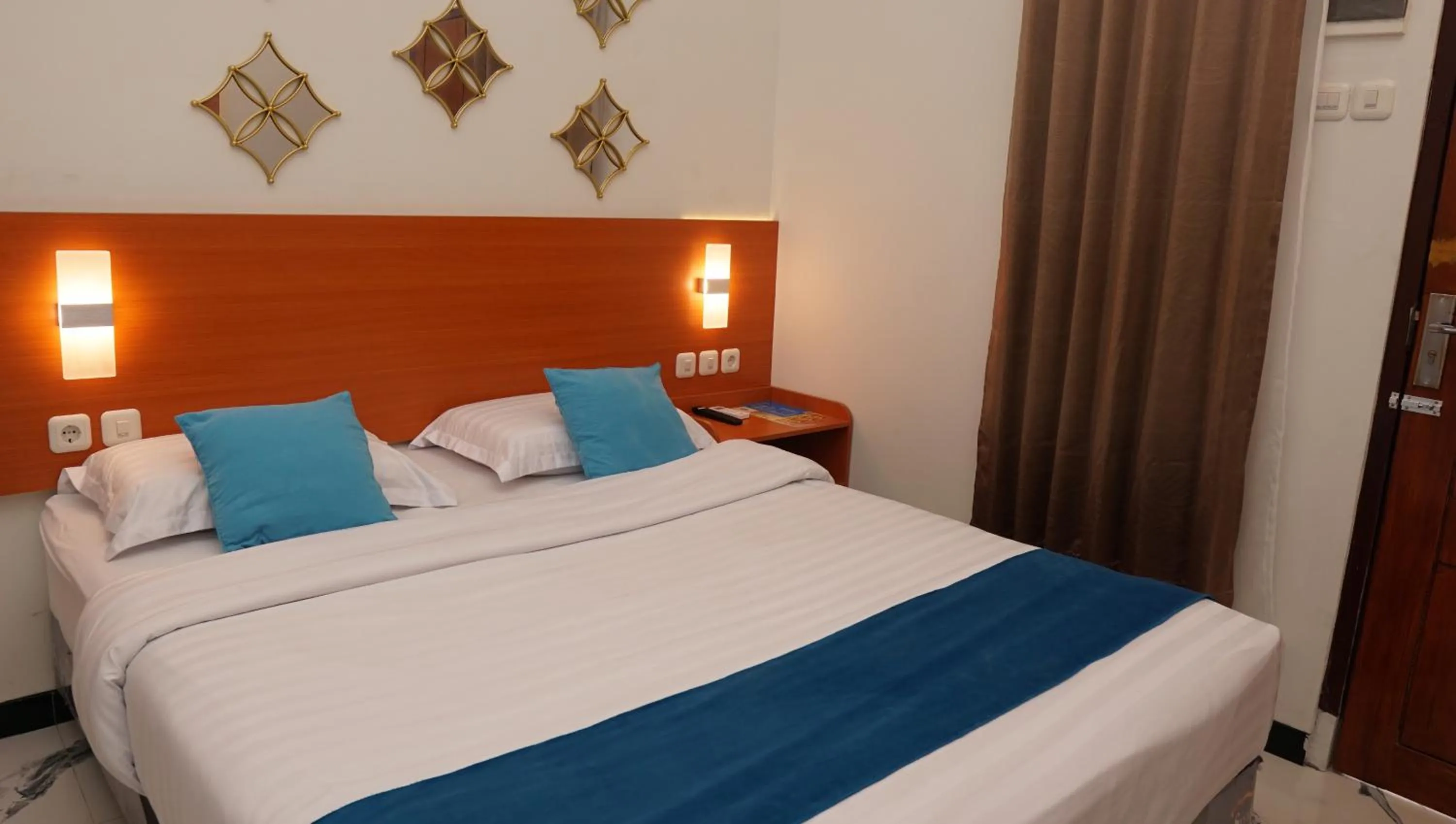 Bed in Jazz Room Kampung Inggris Syariah