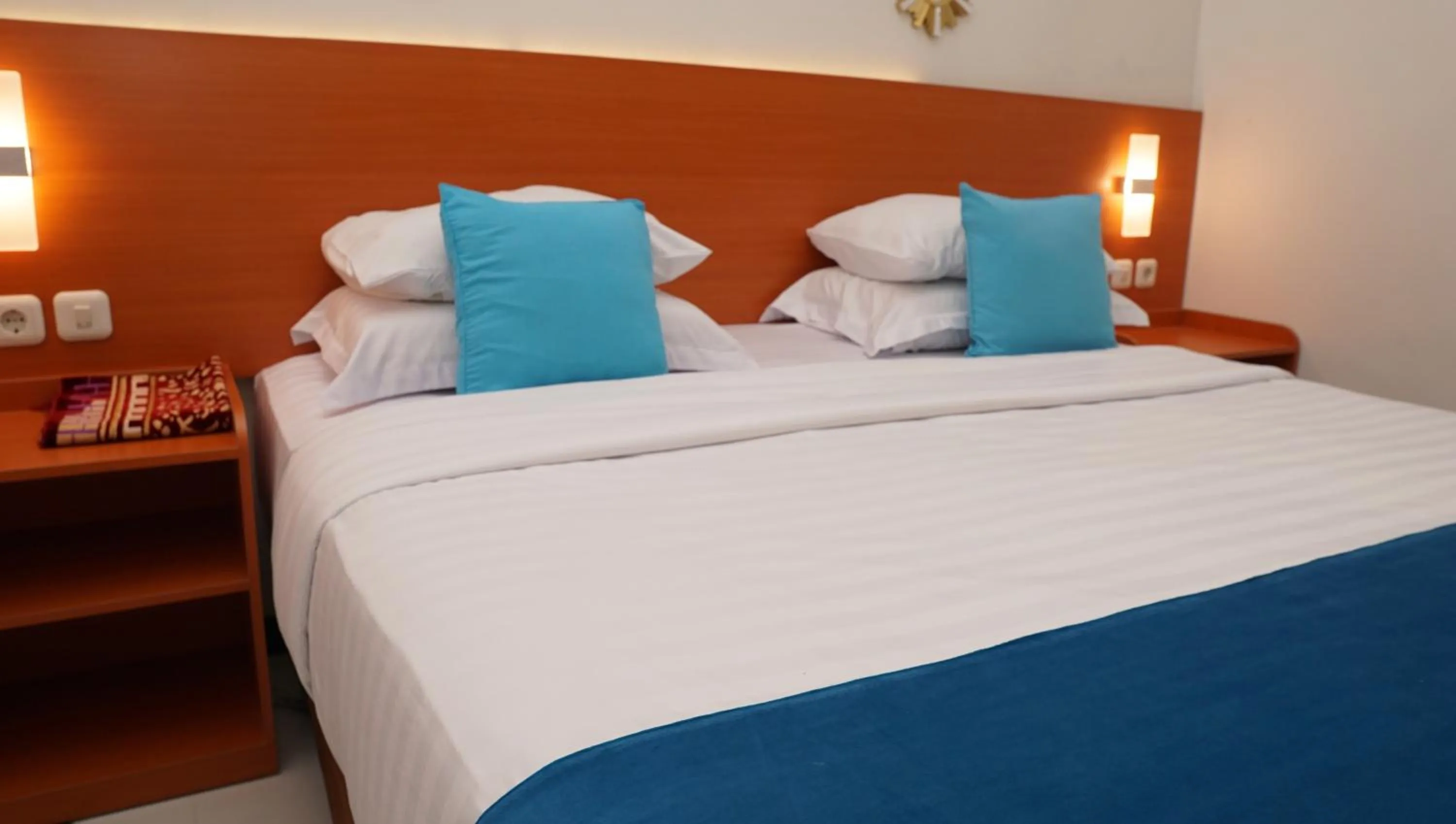 Bed in Jazz Room Kampung Inggris Syariah