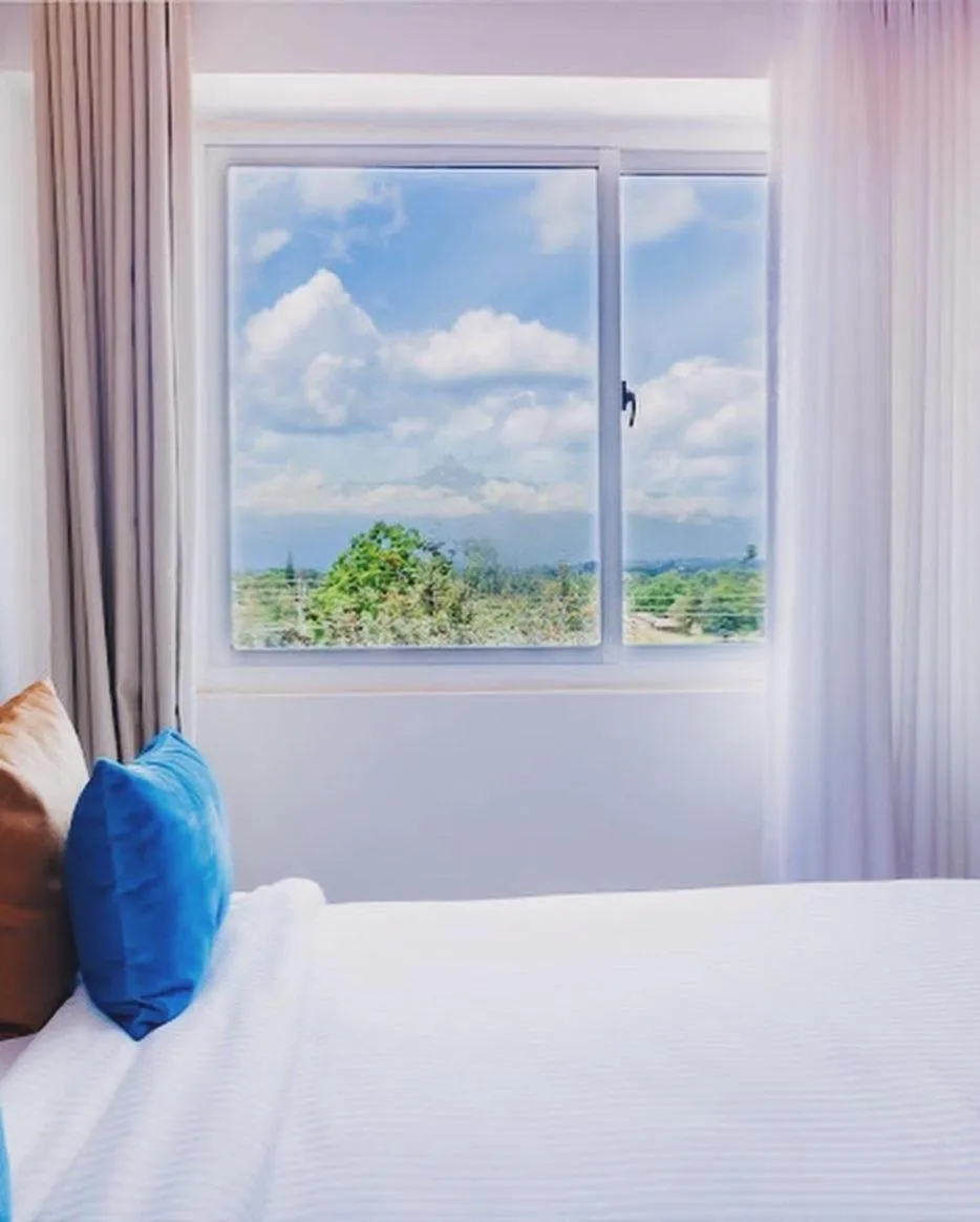 Natural landscape, Bed in The Warwick Hotel, Nanyuki Kenya