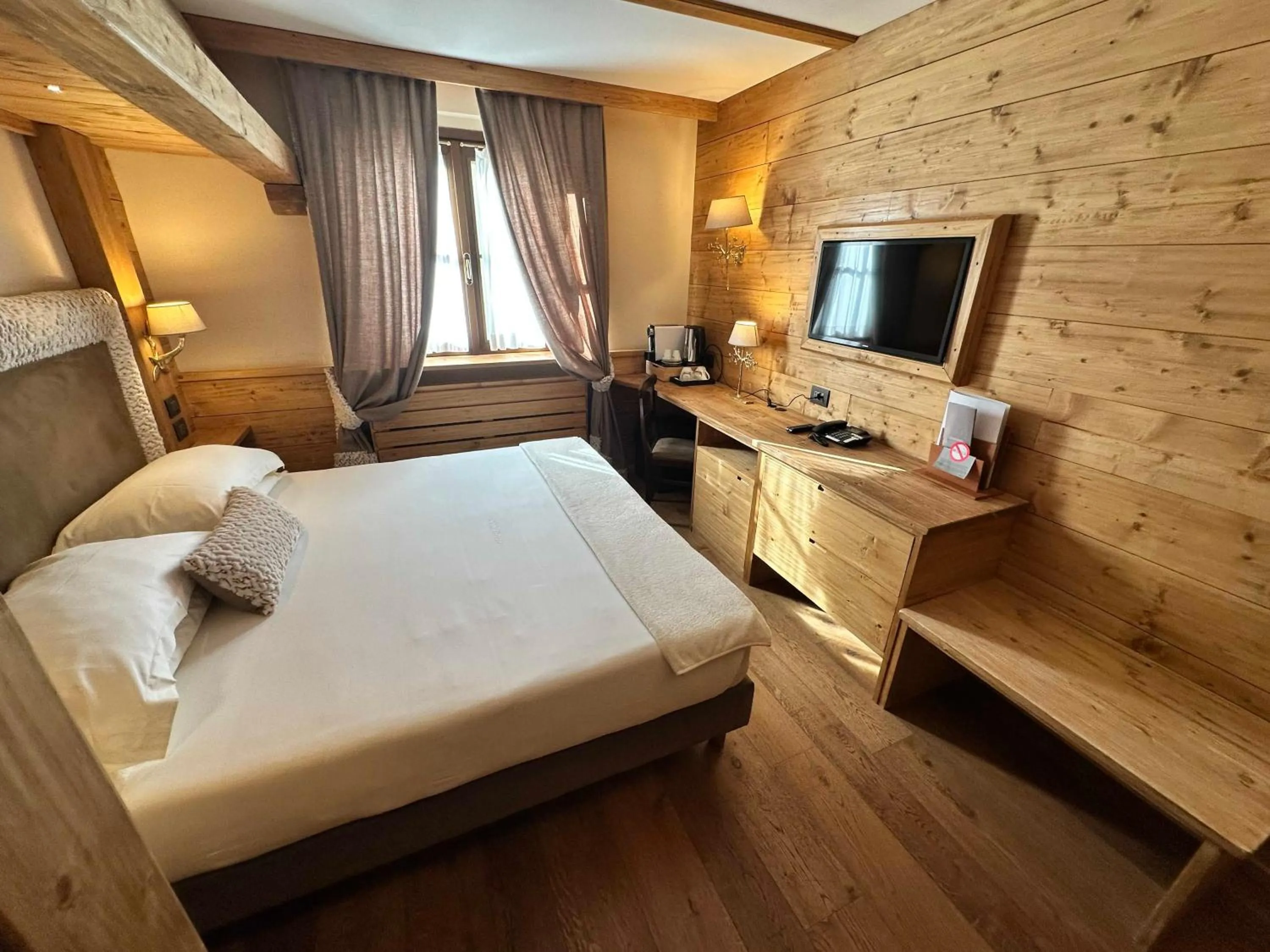 Decorative detail, Bed in Gran Baita Hotel & Wellness