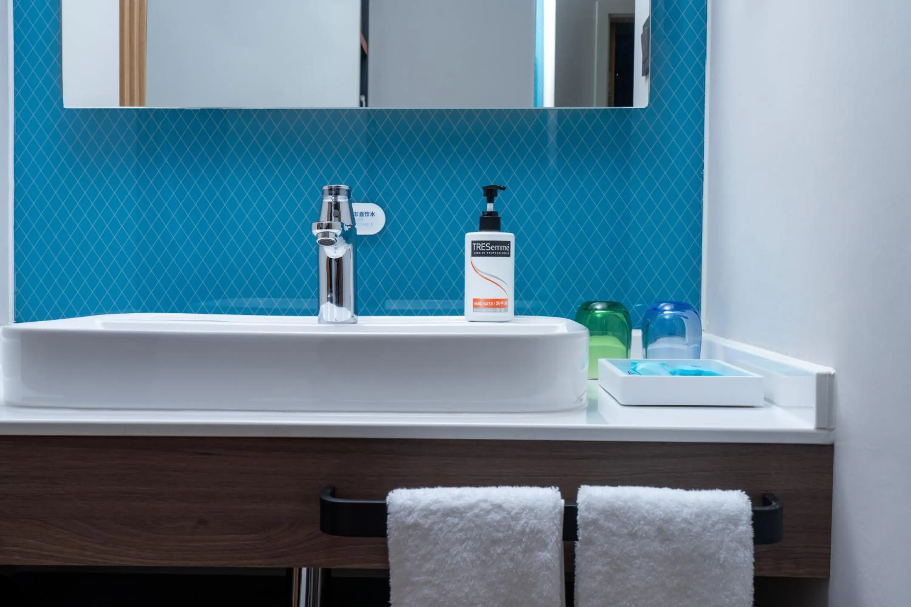 Bathroom in Holiday Inn Express Beihai Silver Beach by IHG