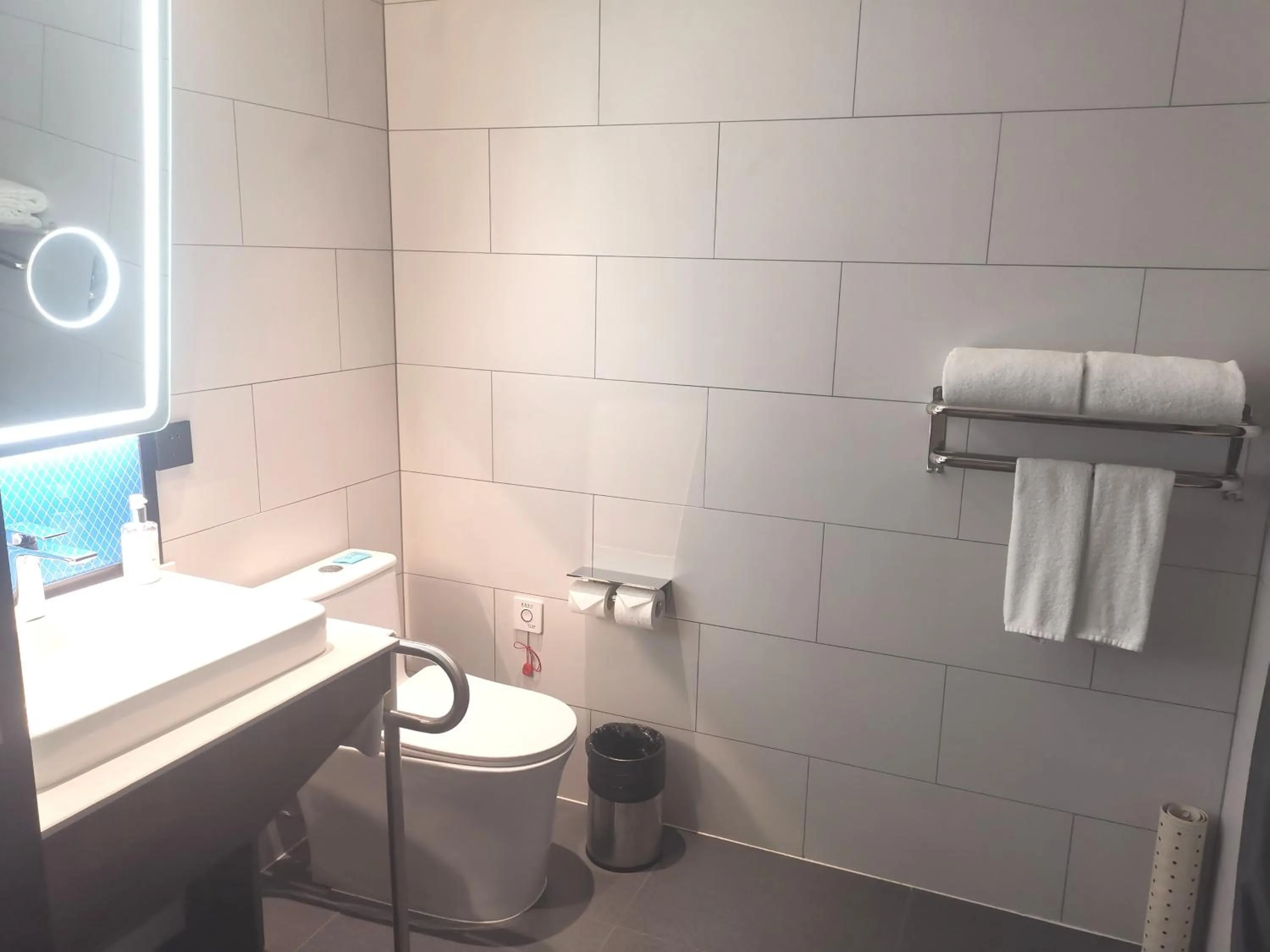 Toilet in Holiday Inn Express Shanghai Expo Centre by IHG