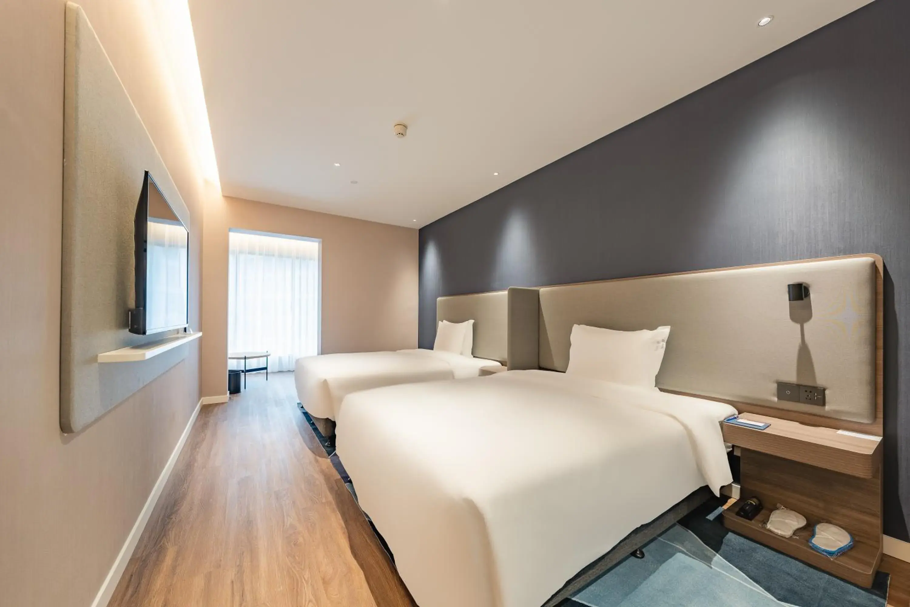 Standard Queen Room with Two Queen Beds and City View in Holiday Inn Express Shanghai Expo Centre by IHG Standard Queen Room with Two Queen Beds and City View in Holiday Inn Express Shanghai Expo Centre by IHG