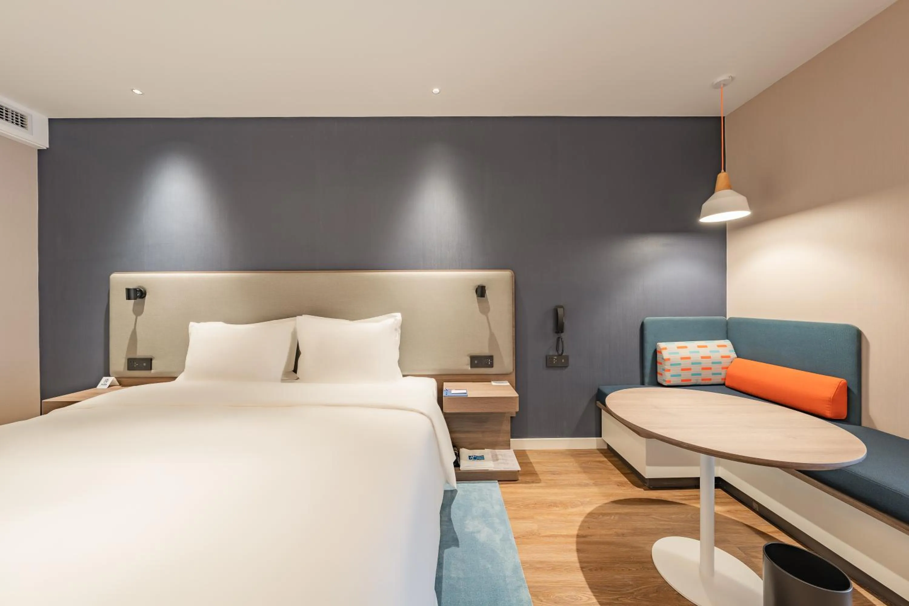 Seating area, Bed in Holiday Inn Express Shanghai Expo Centre by IHG