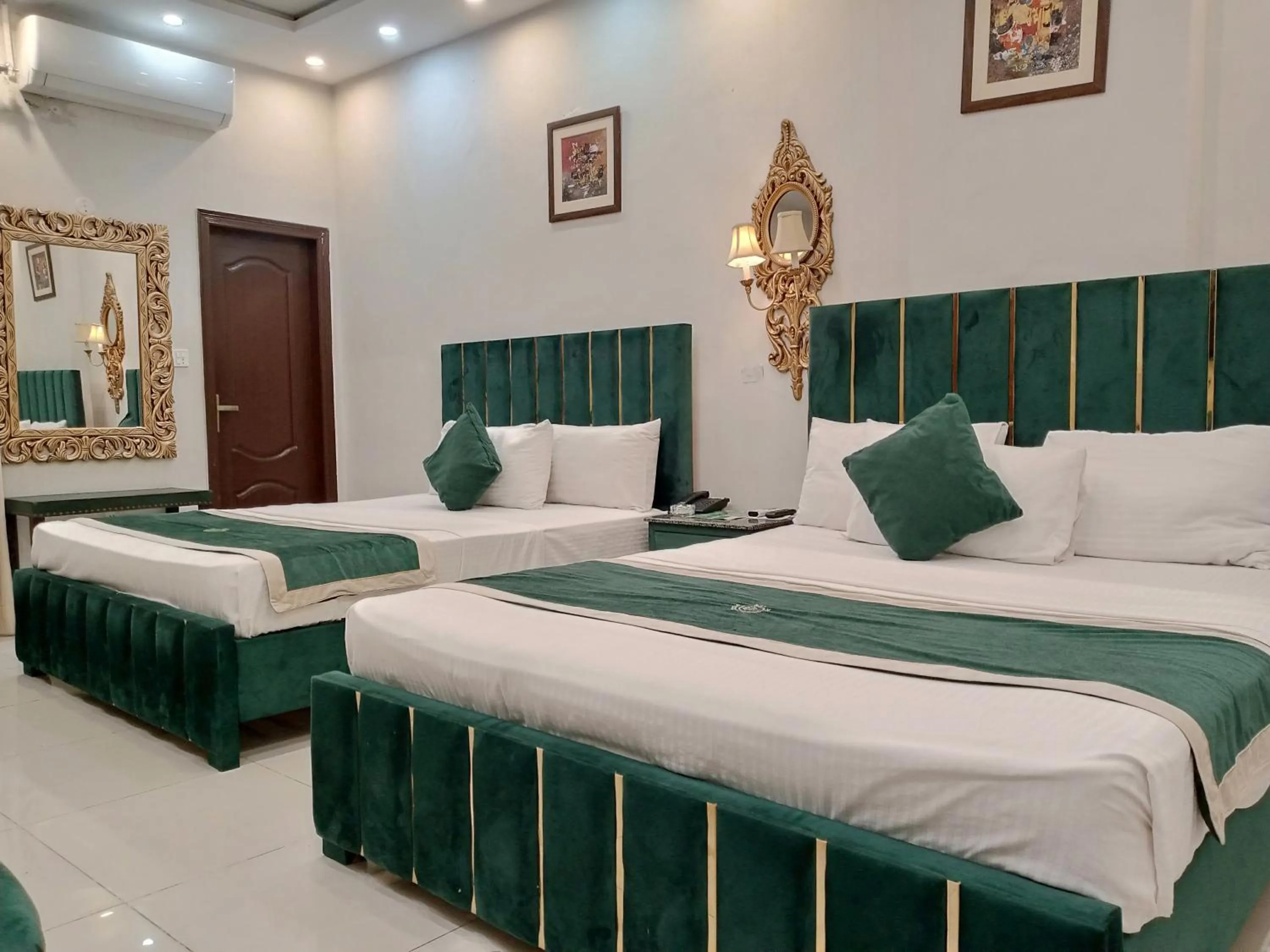 Photo of the whole room, Bed in Golden One Hotel