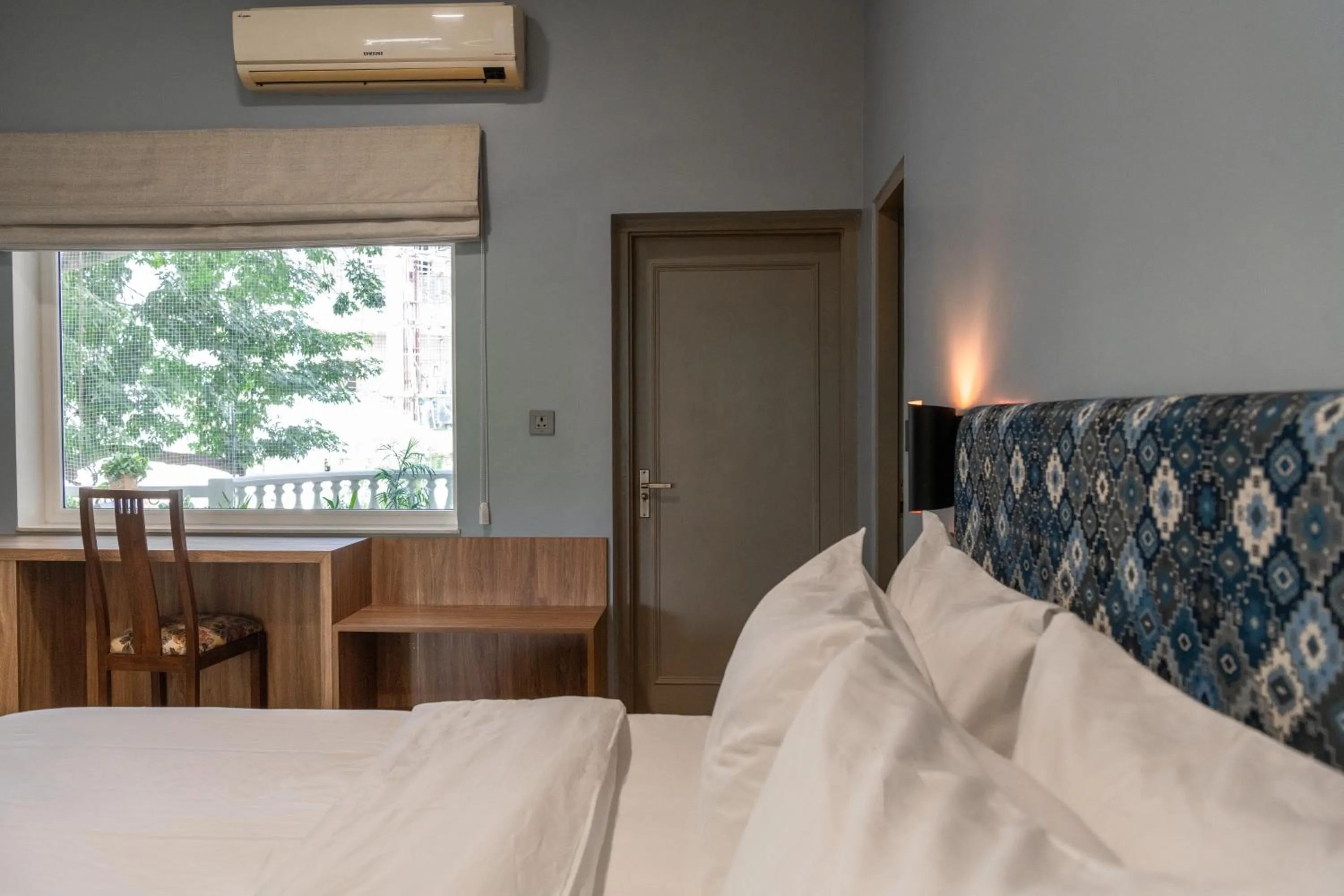 Bed in Girisadan - A City Centre Boutique Hotel