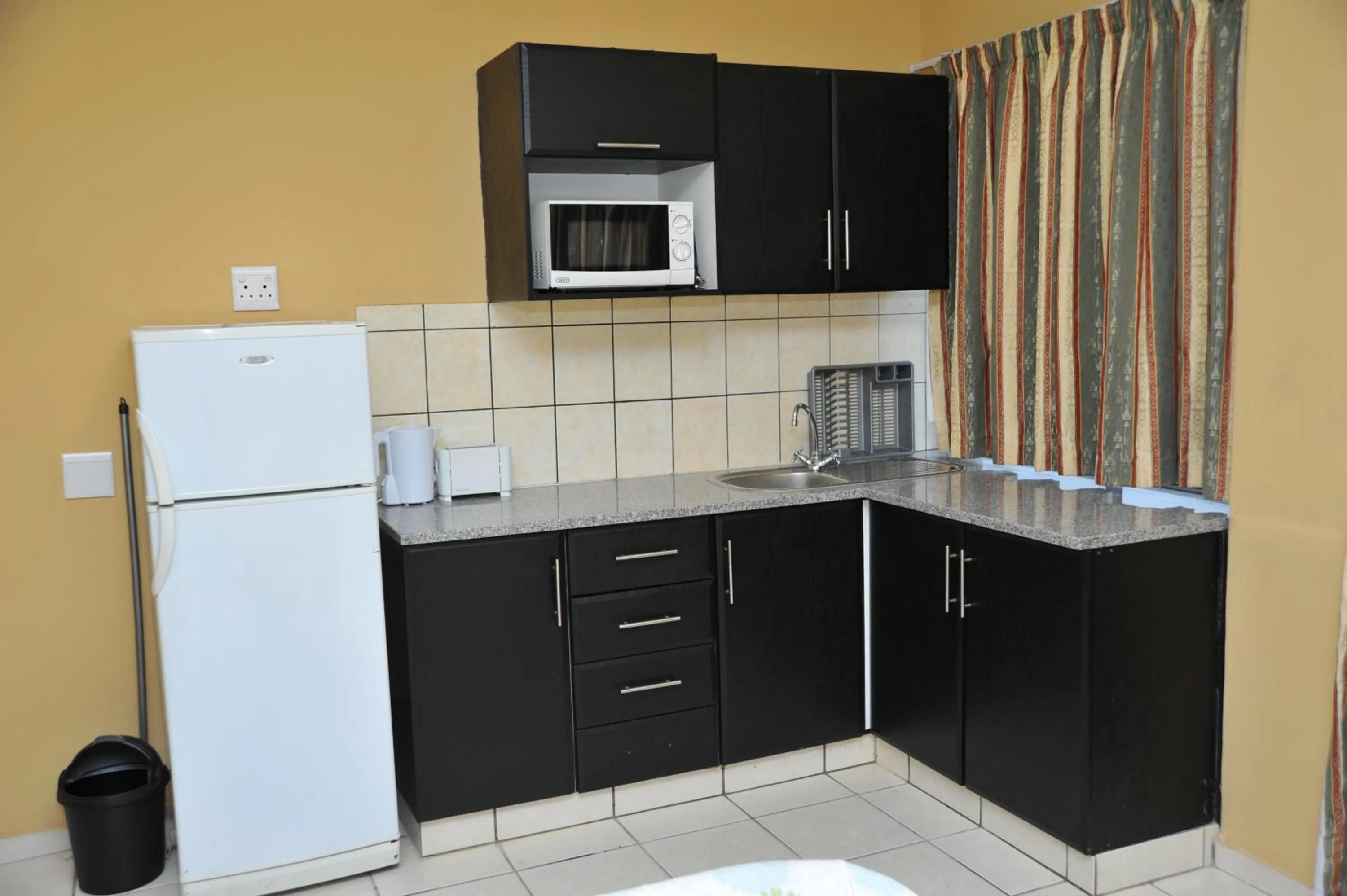 Kitchen or kitchenette in The Norwegian Lodge