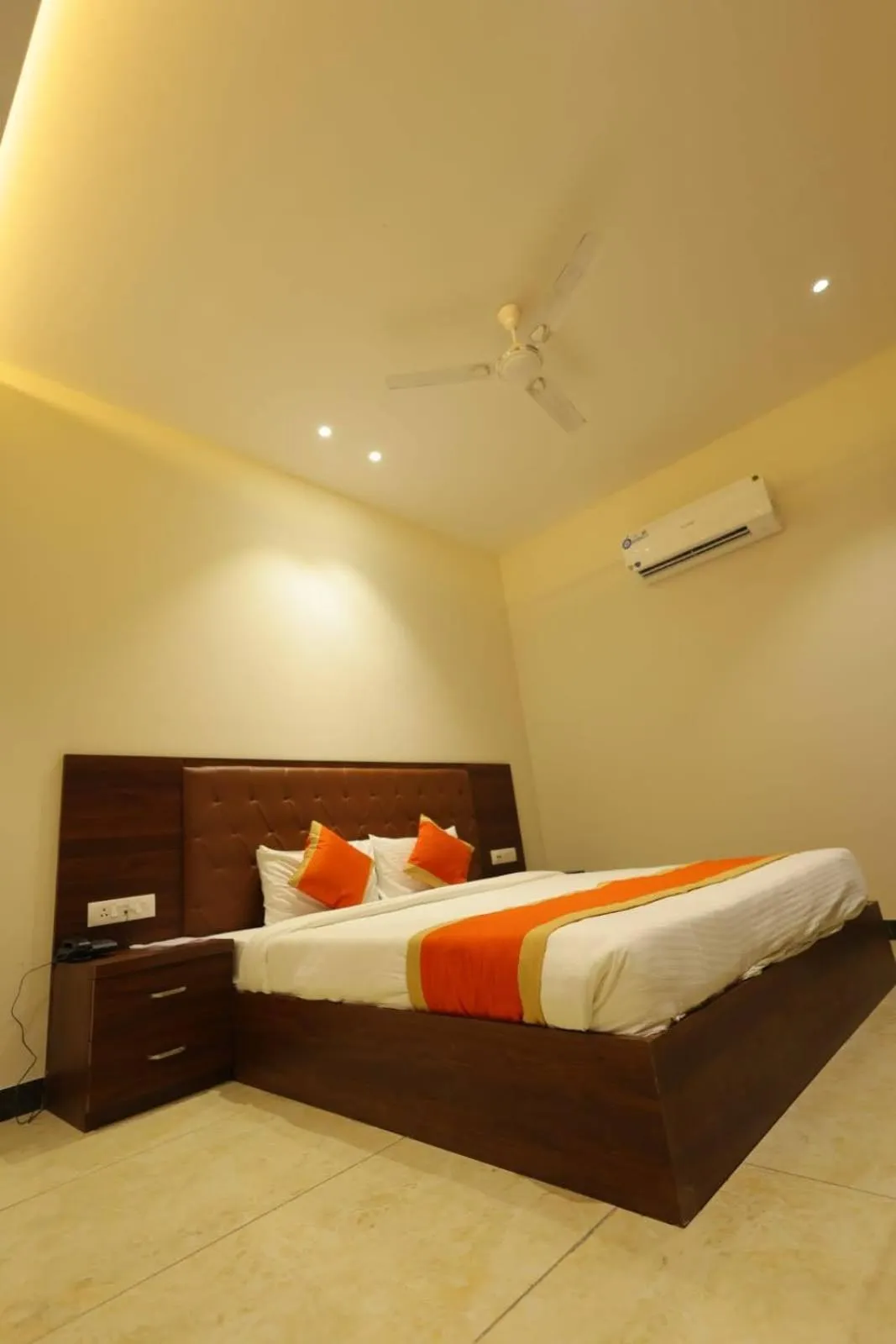 Bed in The Grand Tree Hotel