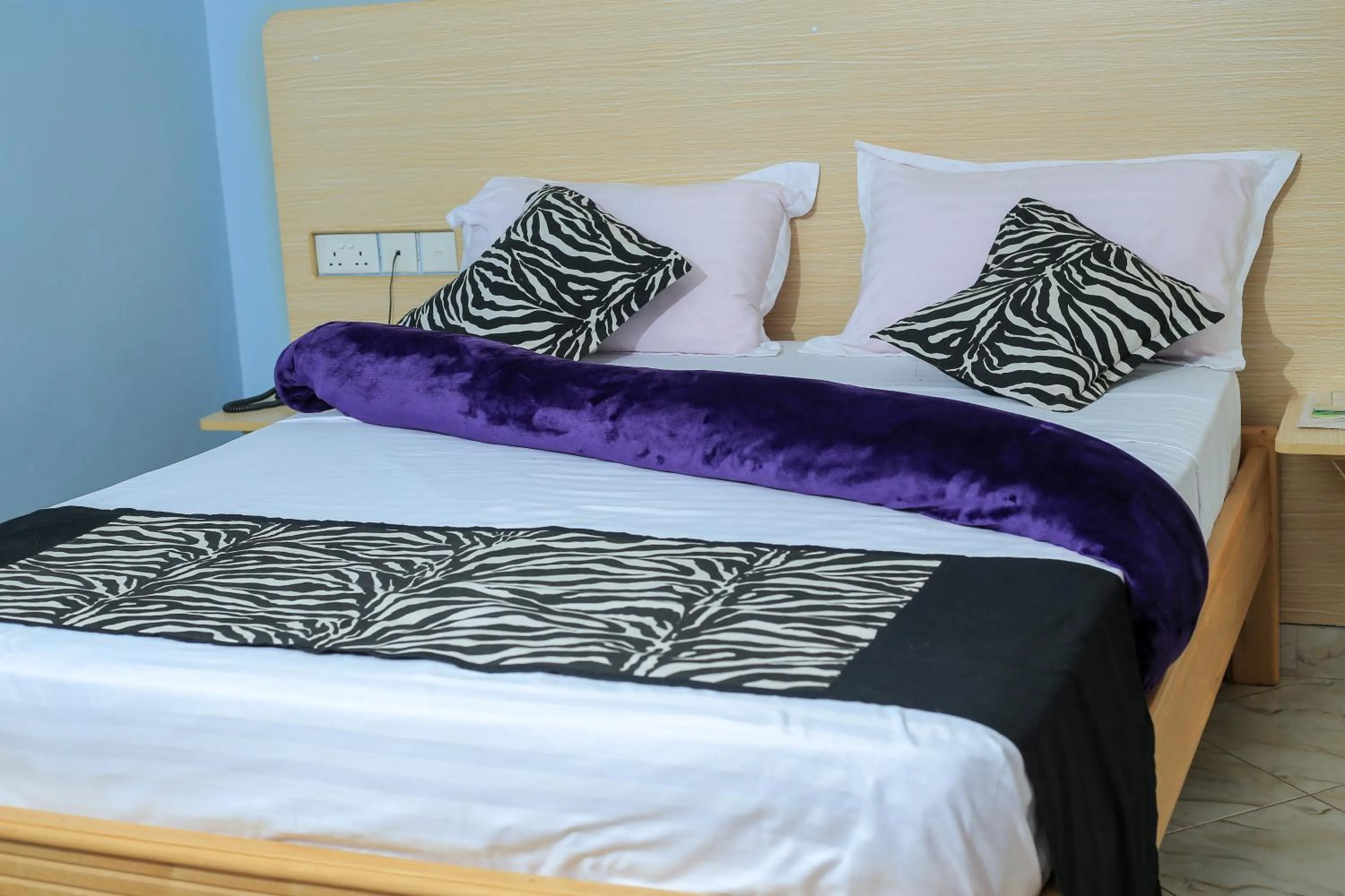 Bed in Triple Tee Gardens & Accomodation