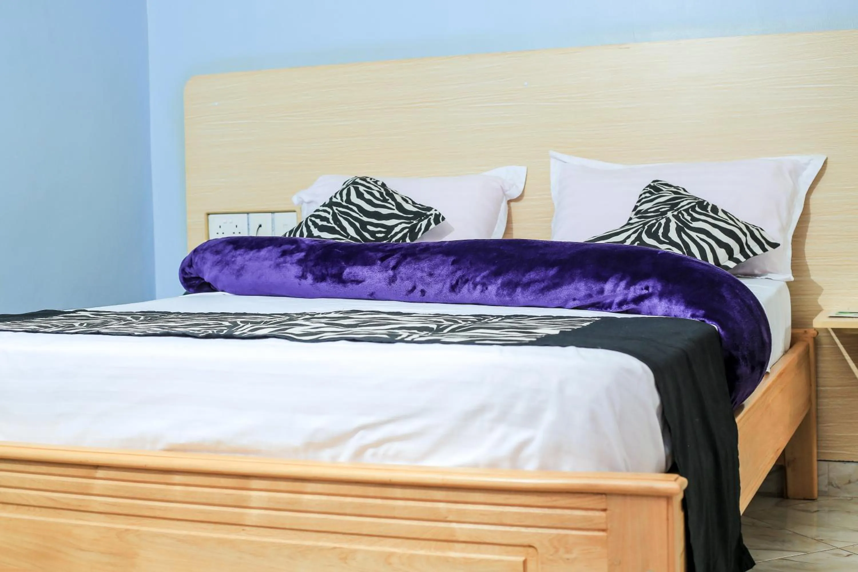 Bed in Triple Tee Gardens & Accomodation