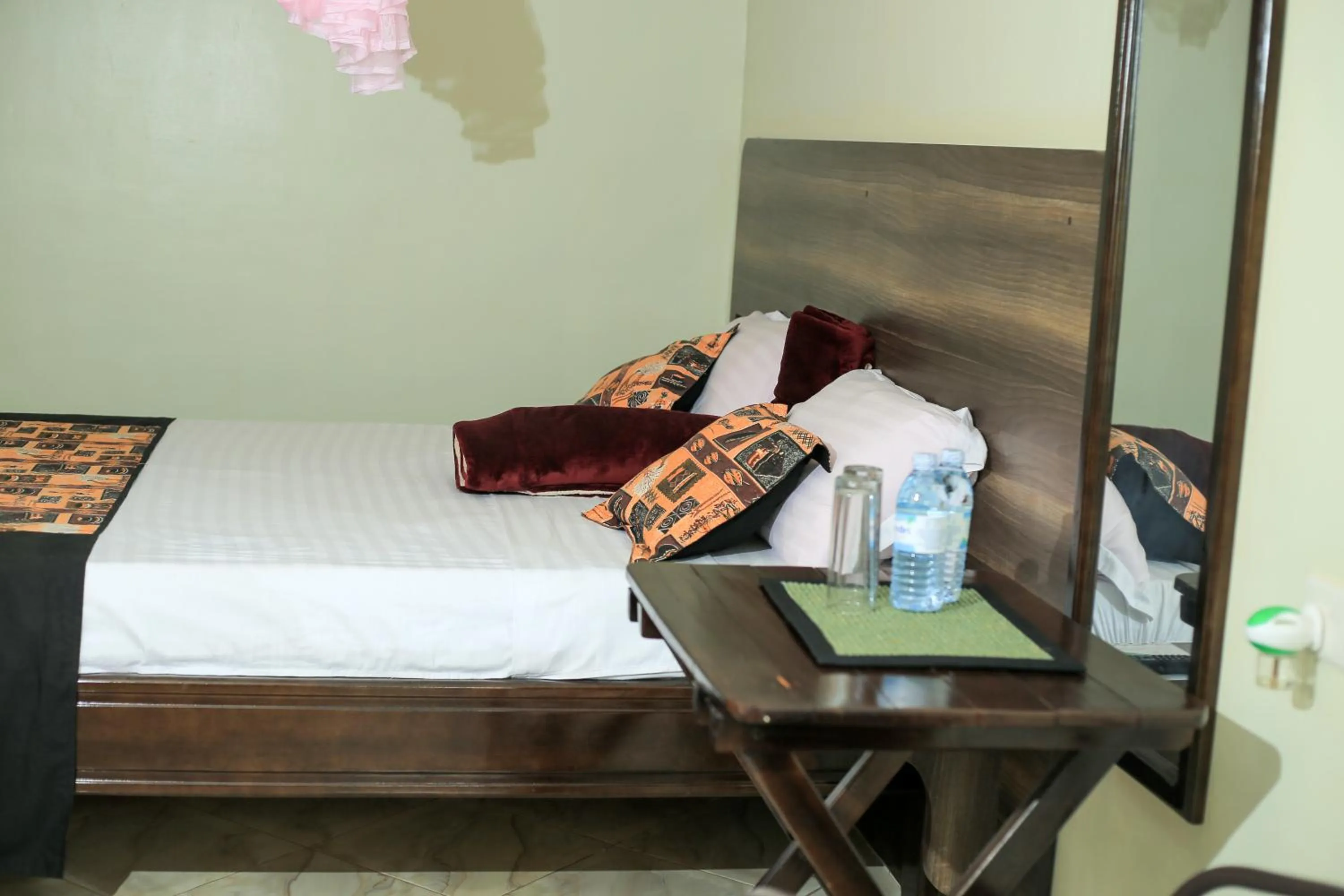 Bed in Triple Tee Gardens & Accomodation