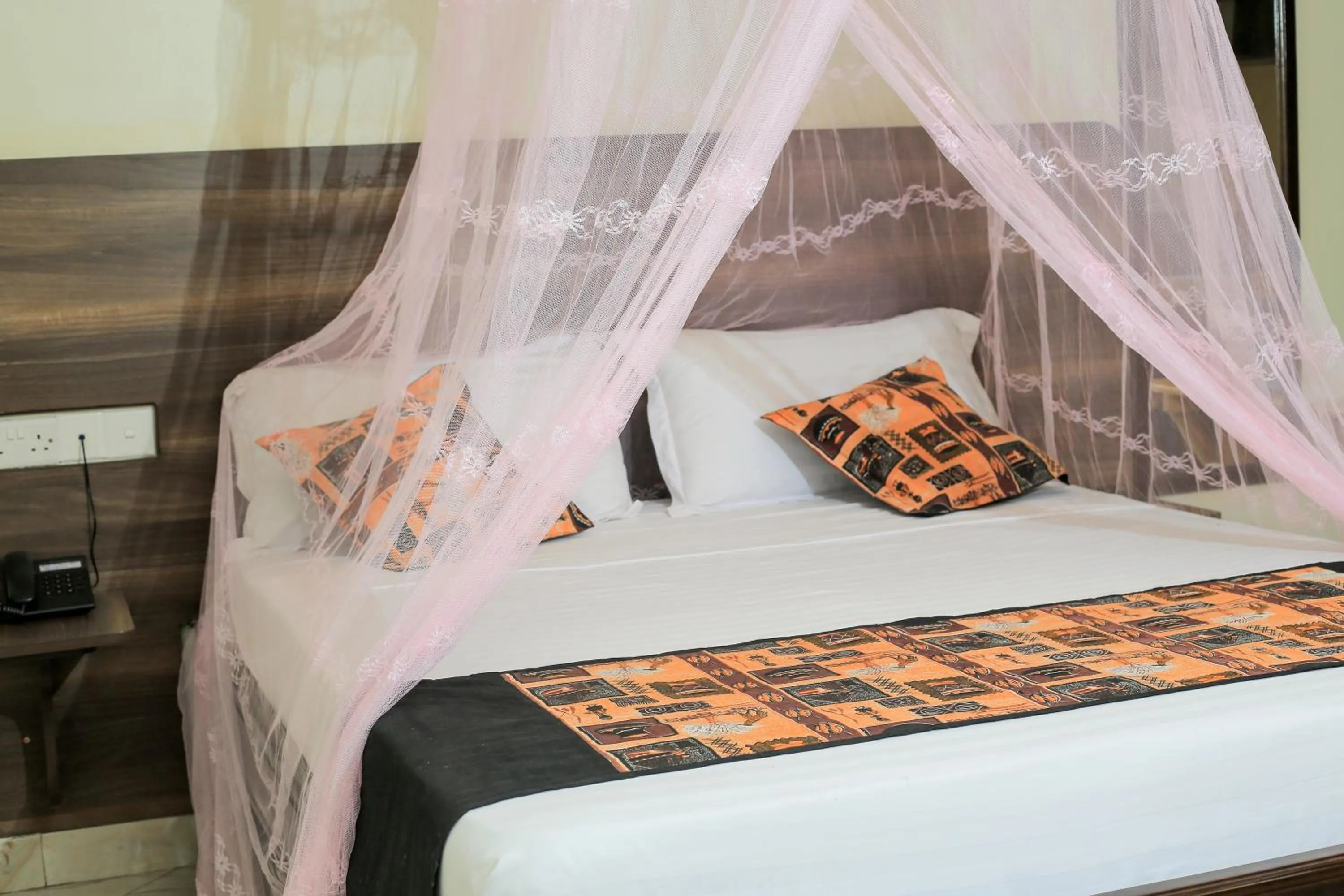 Bed in Triple Tee Gardens & Accomodation