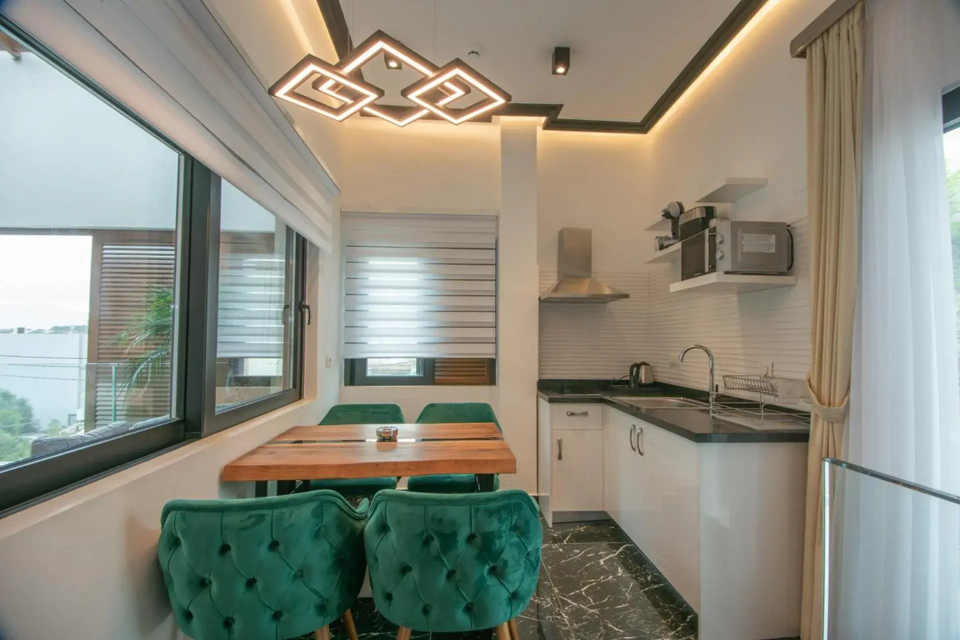 Junior Suite Side Sea View with Outdoor Jetted Tub in Lazar Lux Suites - Ammoudara Junior Suite Side Sea View with Outdoor Jetted Tub in Lazar Lux Suites - Ammoudara