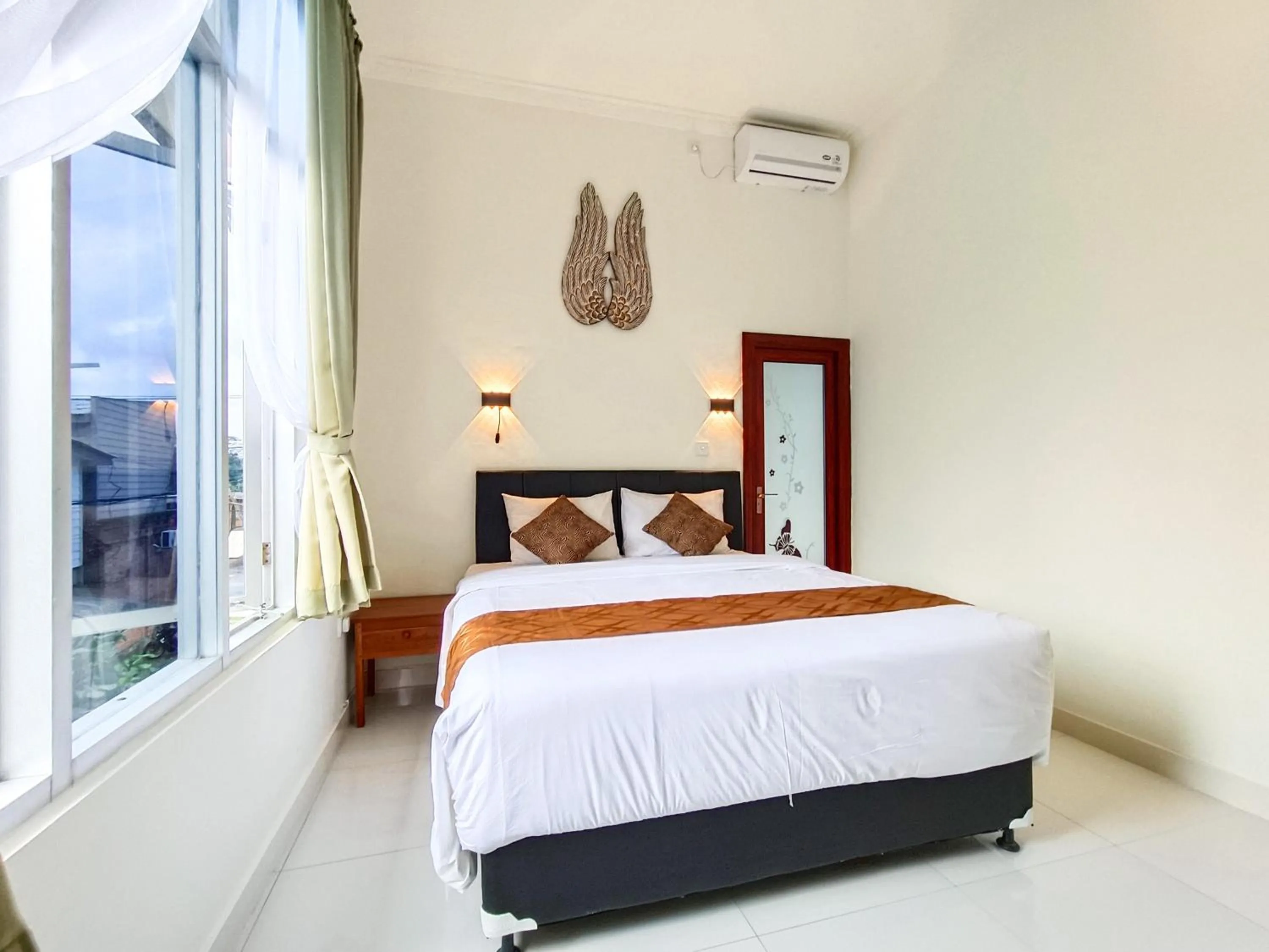Bed in The Tunjung Boutique Resort