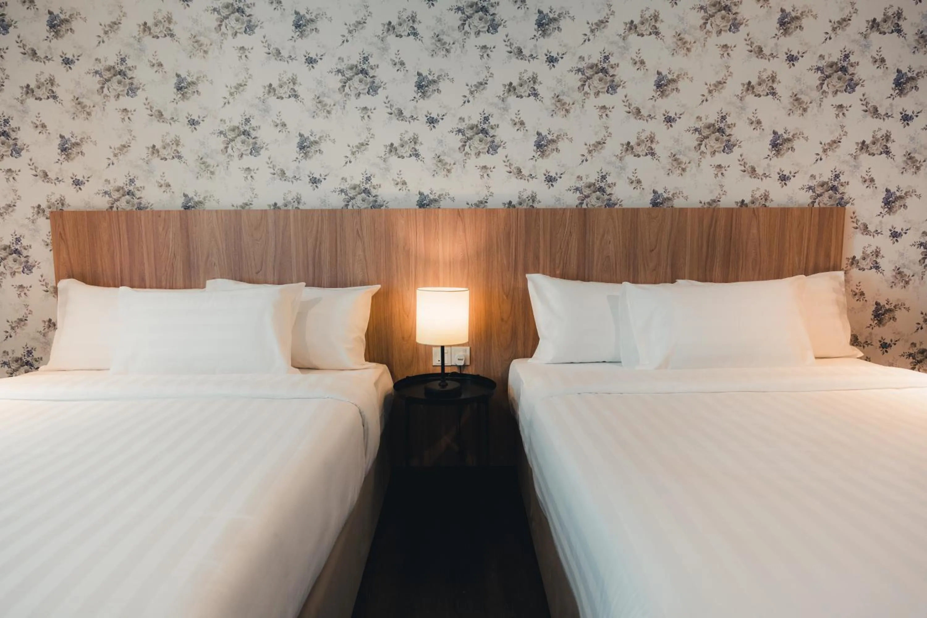 Bed in Le'venue Hotel