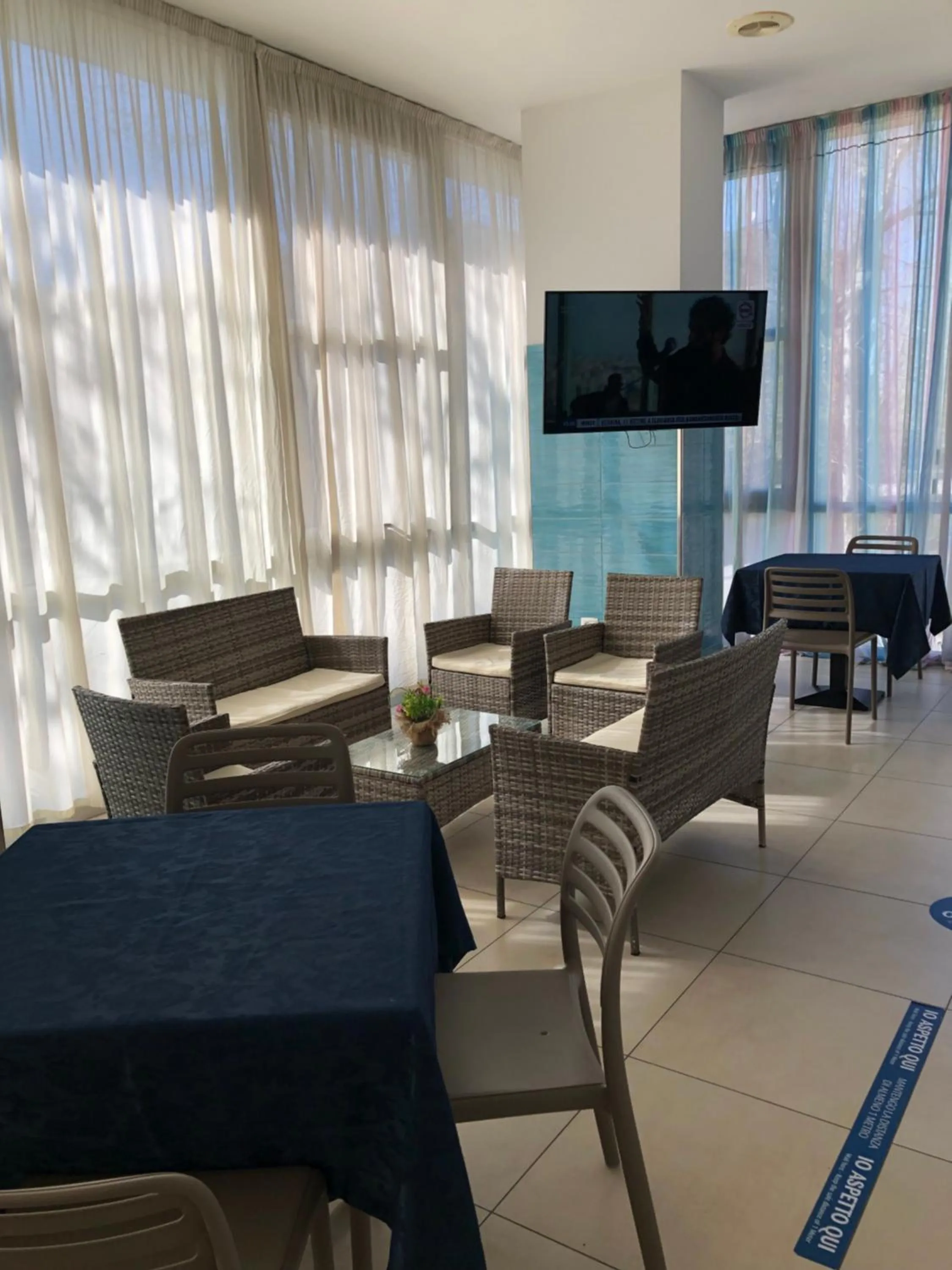 Communal lounge/ TV room in Hotel Napoleon