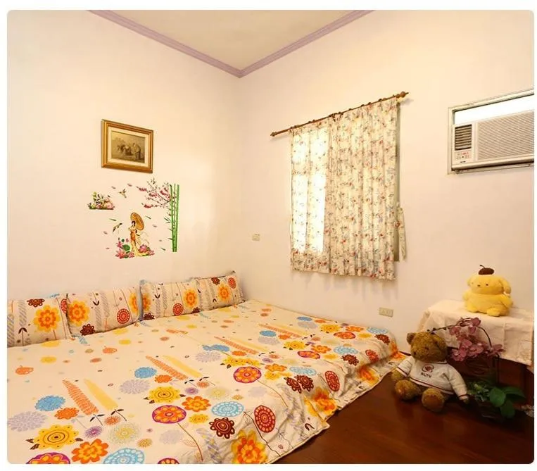 Bed in Yilan Xiang Feng Homestay