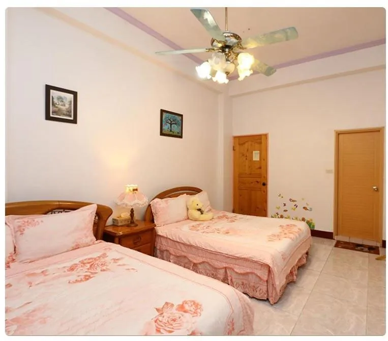 Bed in Yilan Xiang Feng Homestay