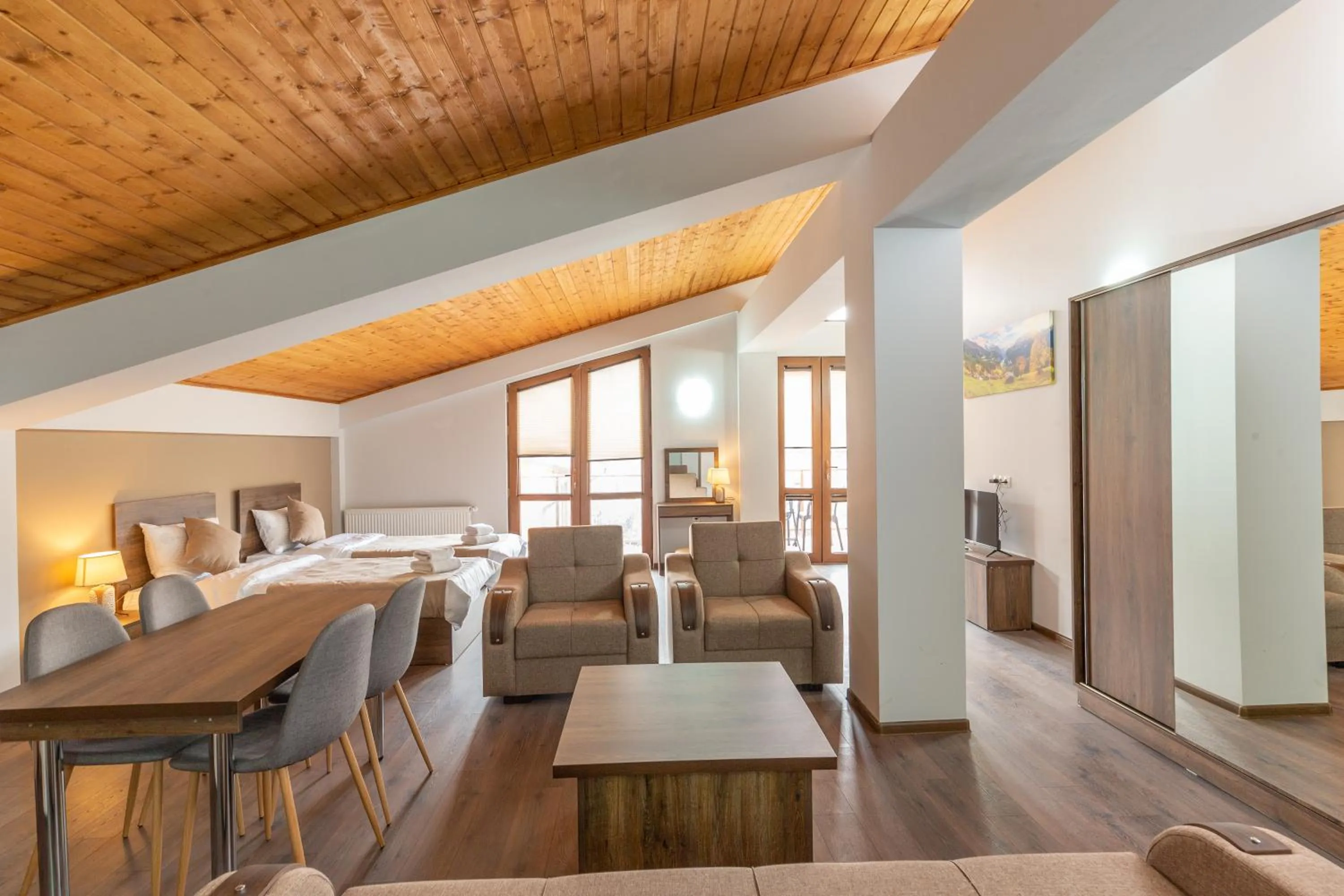 Living room in Pine Chalets by KA Group