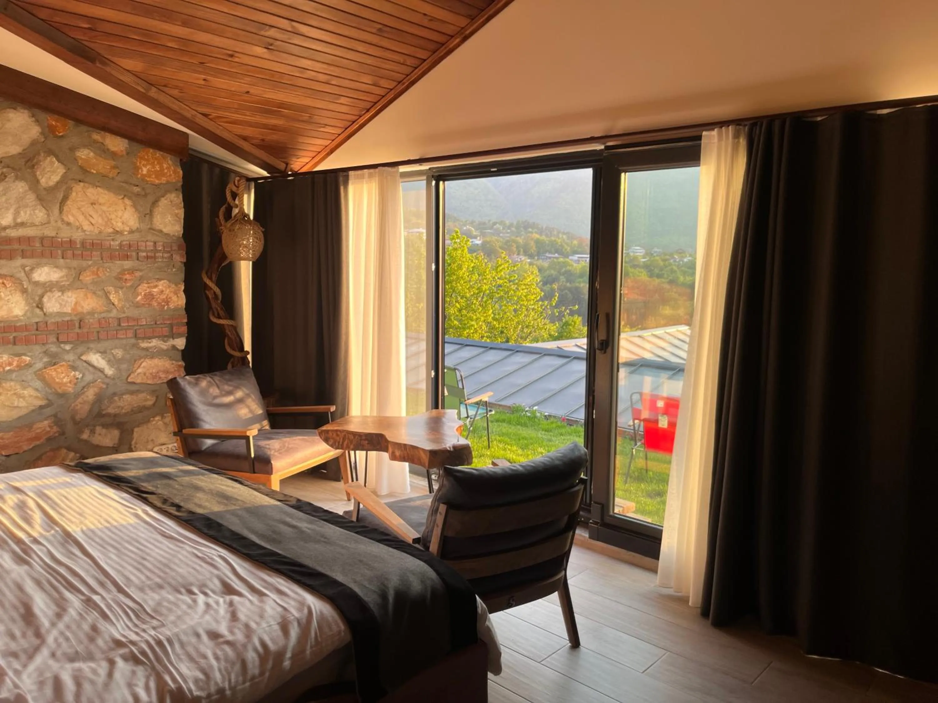 Seating area, Bed in Masklavi