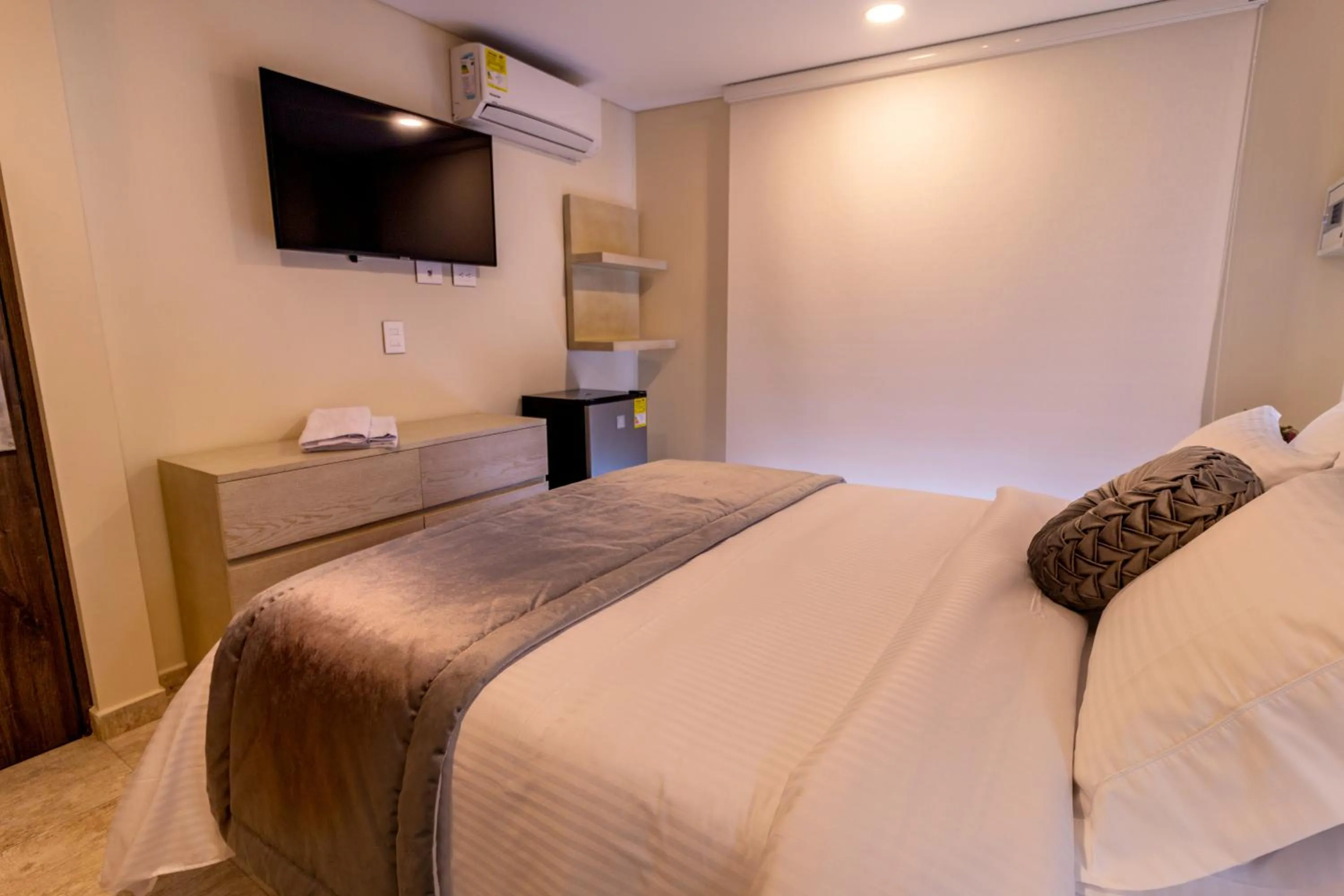 Bed in Trugo Luxury Rooms