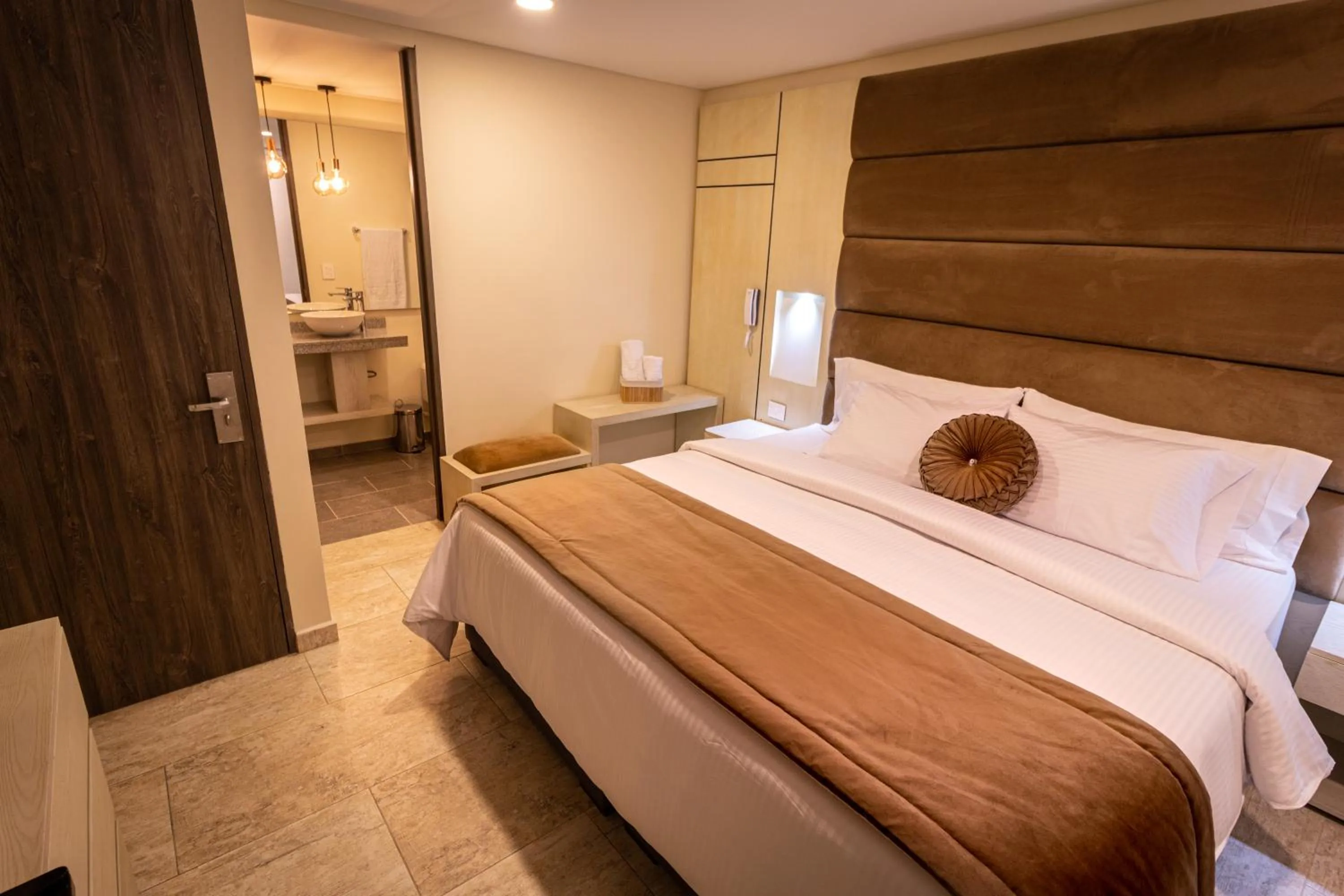 Bed in Trugo Luxury Rooms