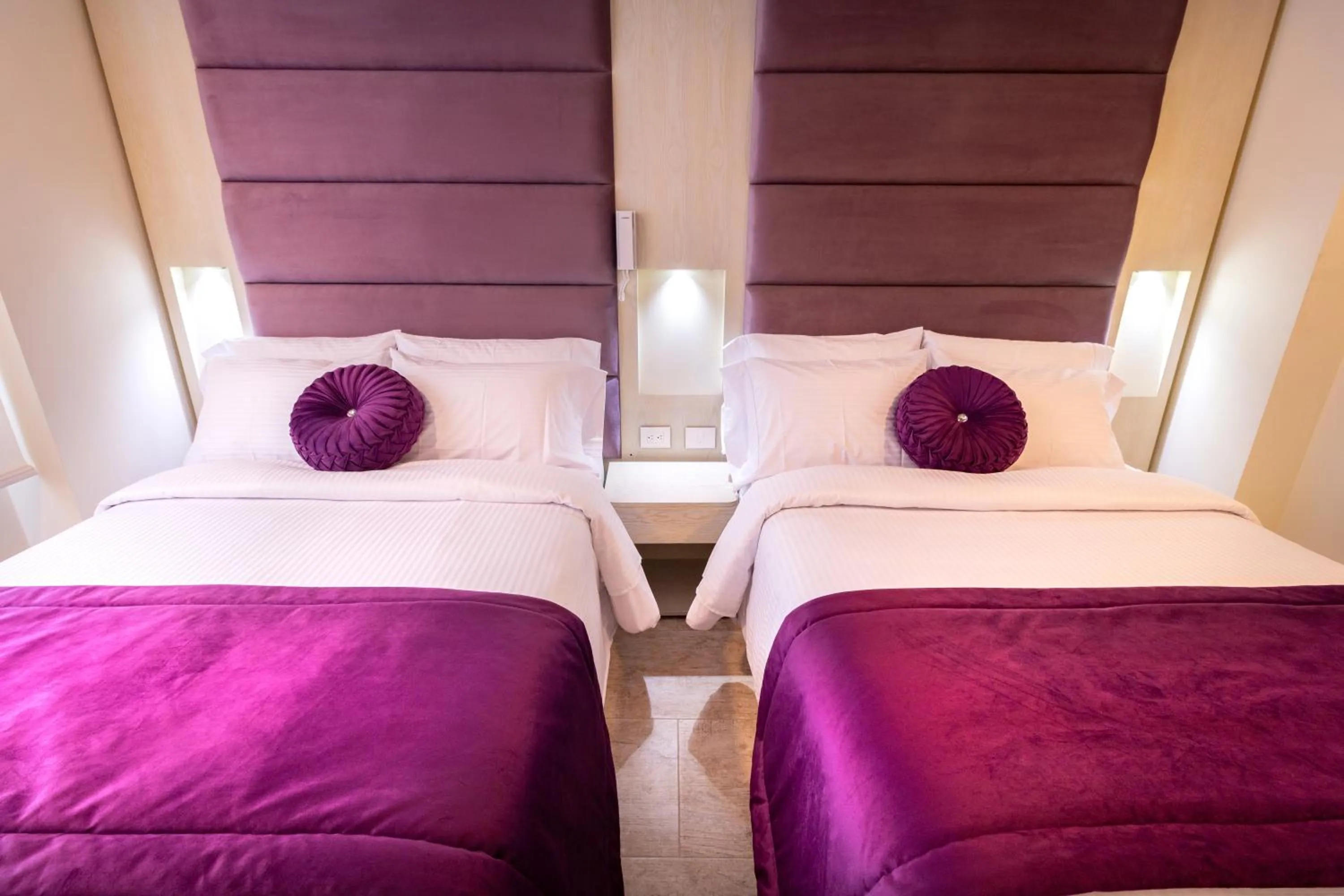 Bed in Trugo Luxury Rooms