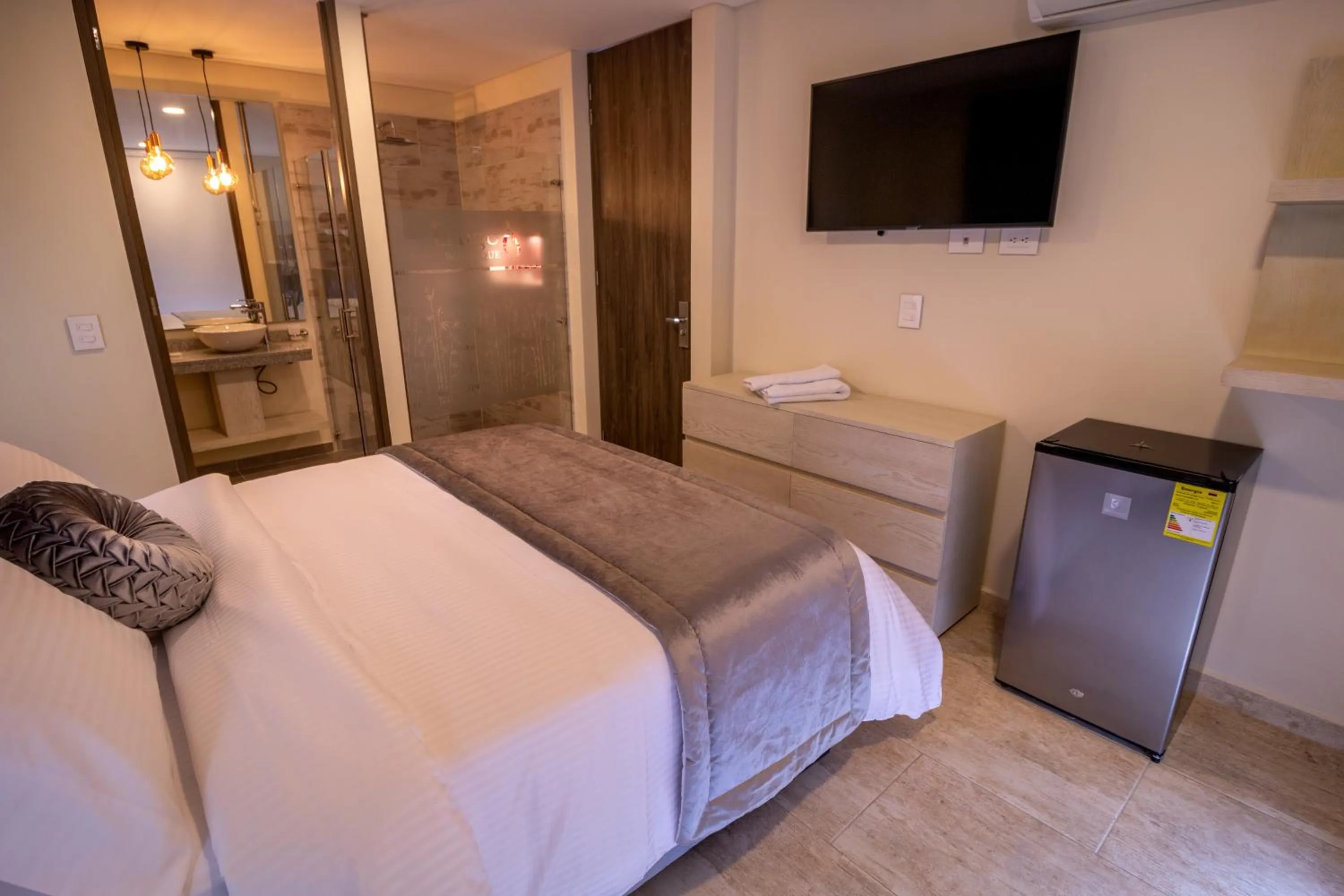 Bed in Trugo Luxury Rooms